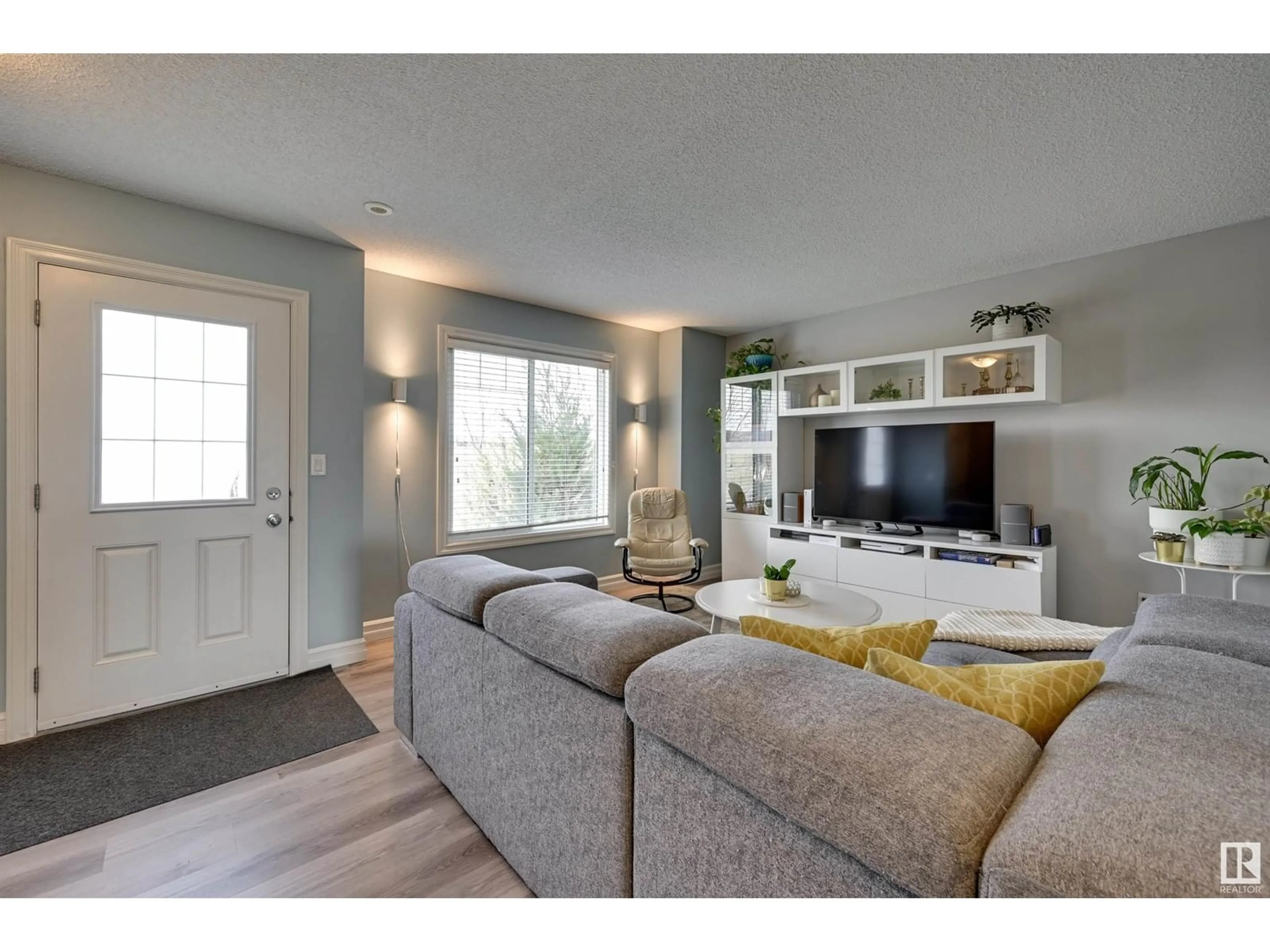Living room with furniture, unknown for #116 - 3625 144 AV, Edmonton Alberta T5Y0T3