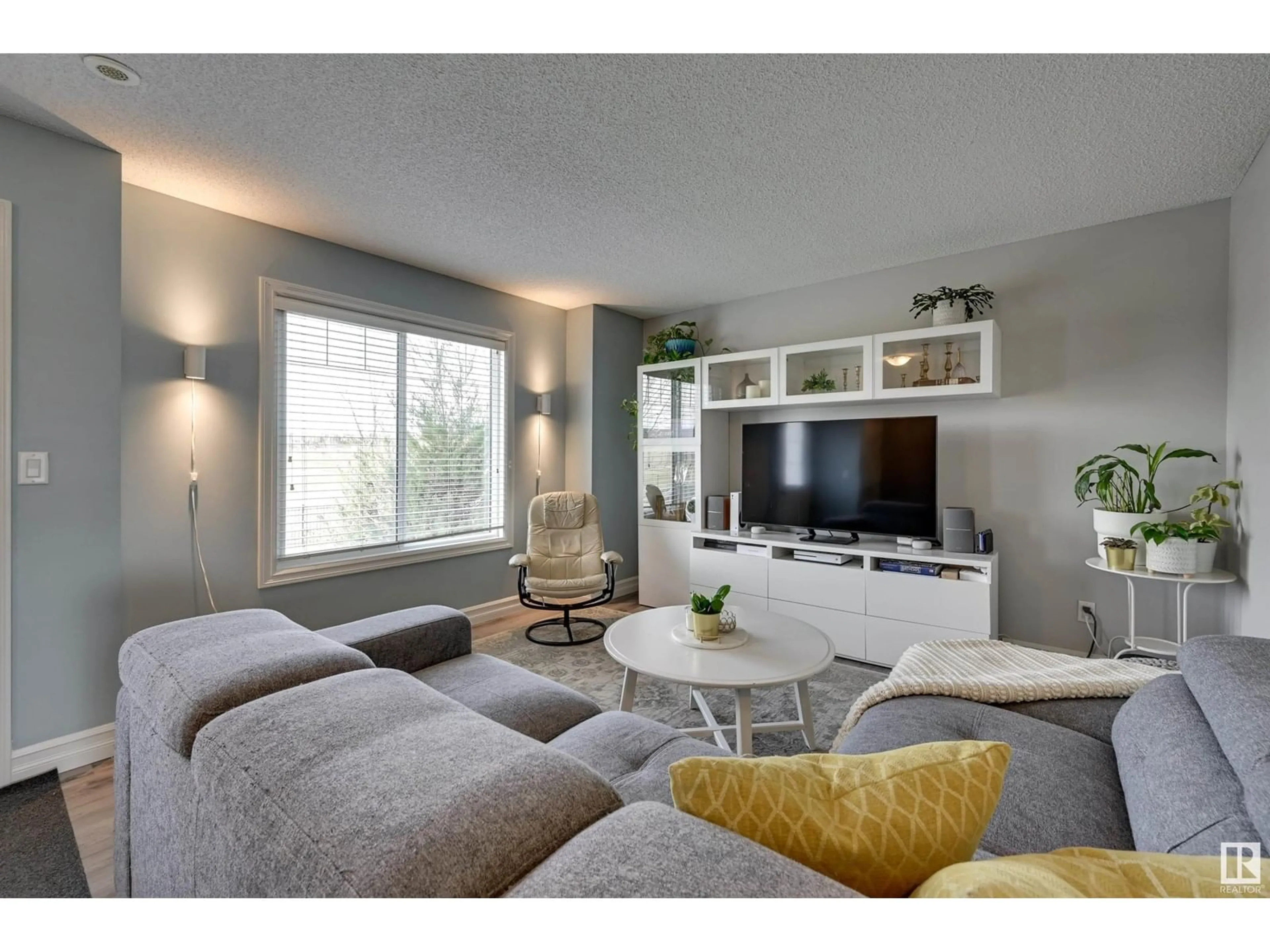 Living room with furniture, unknown for #116 - 3625 144 AV, Edmonton Alberta T5Y0T3