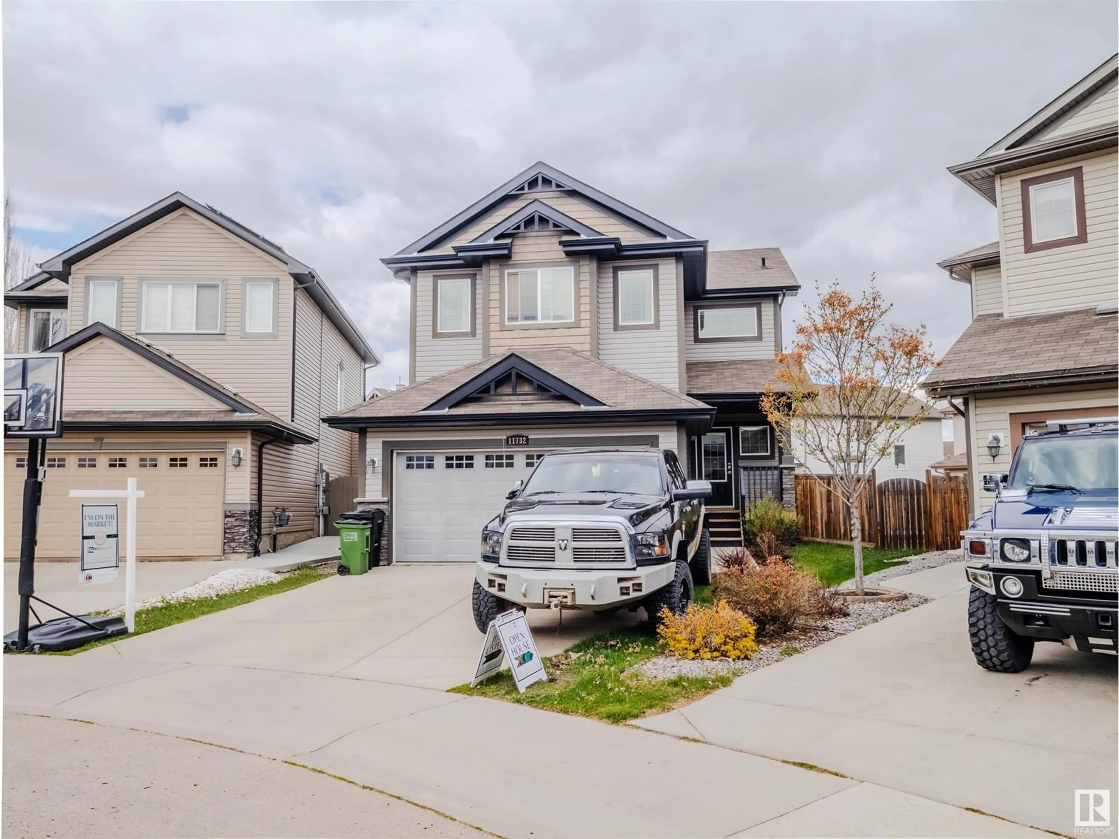 Home with vinyl exterior material, street for SW - 11732 18 AV, Edmonton Alberta T6W2E7