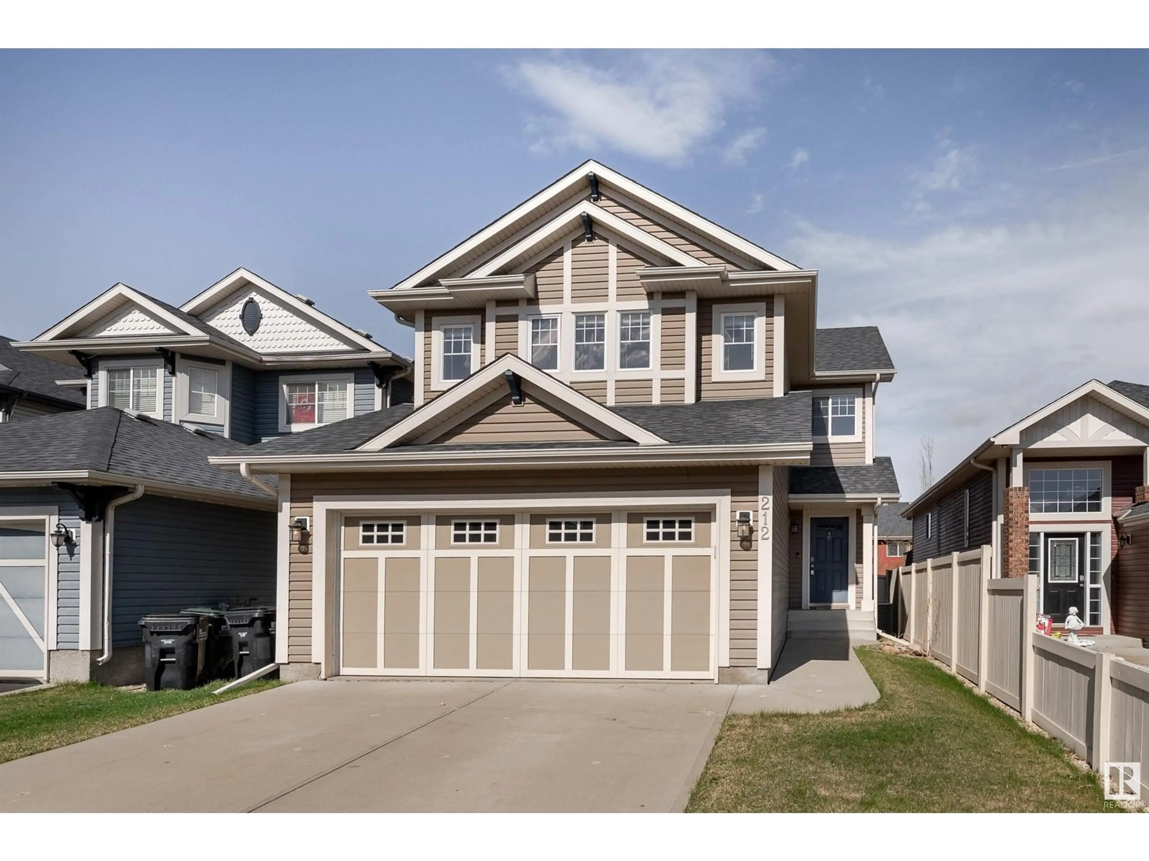 Home with vinyl exterior material, street for 212 ASCOTT CR, Sherwood Park Alberta T8H0A6