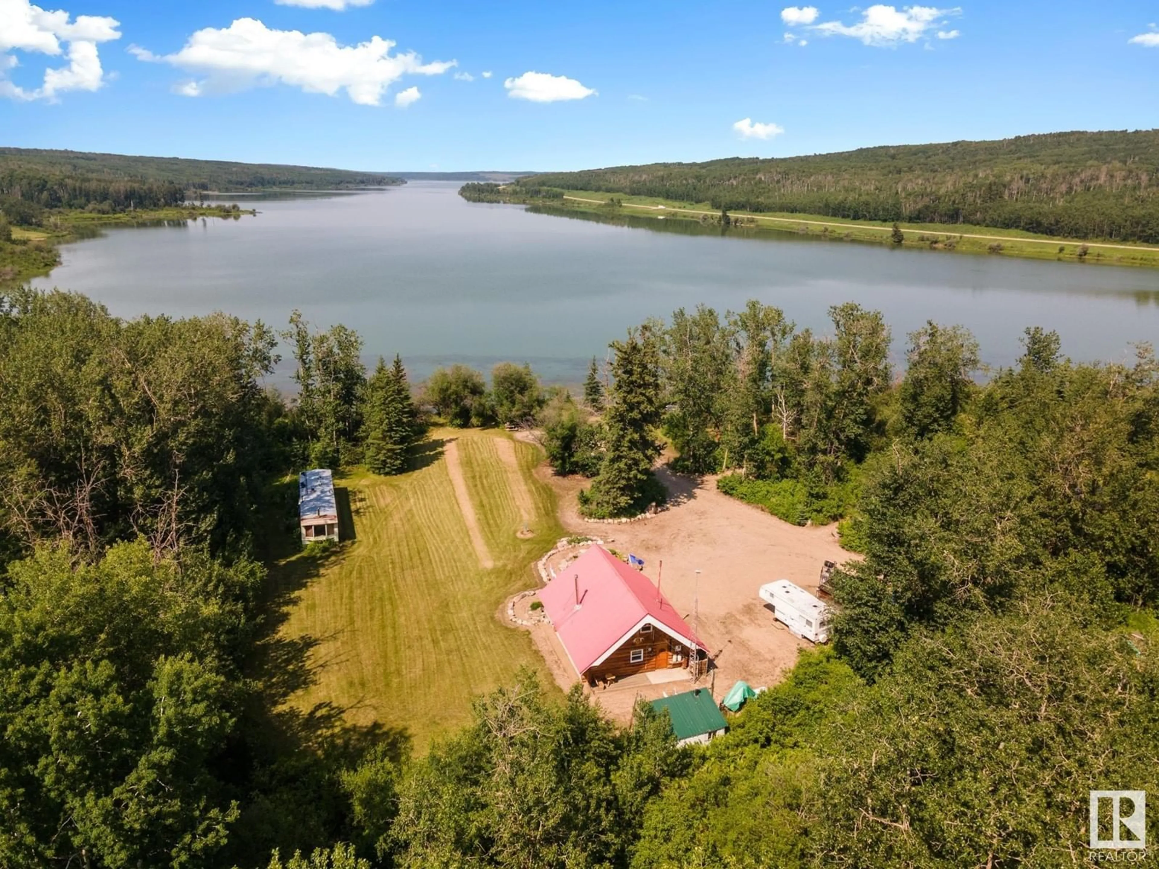 A pic from outside/outdoor area/front of a property/back of a property/a pic from drone, water/lake/river/ocean view for A - 58227 RNG RD 70, Rural St. Paul County Alberta T0A0G1