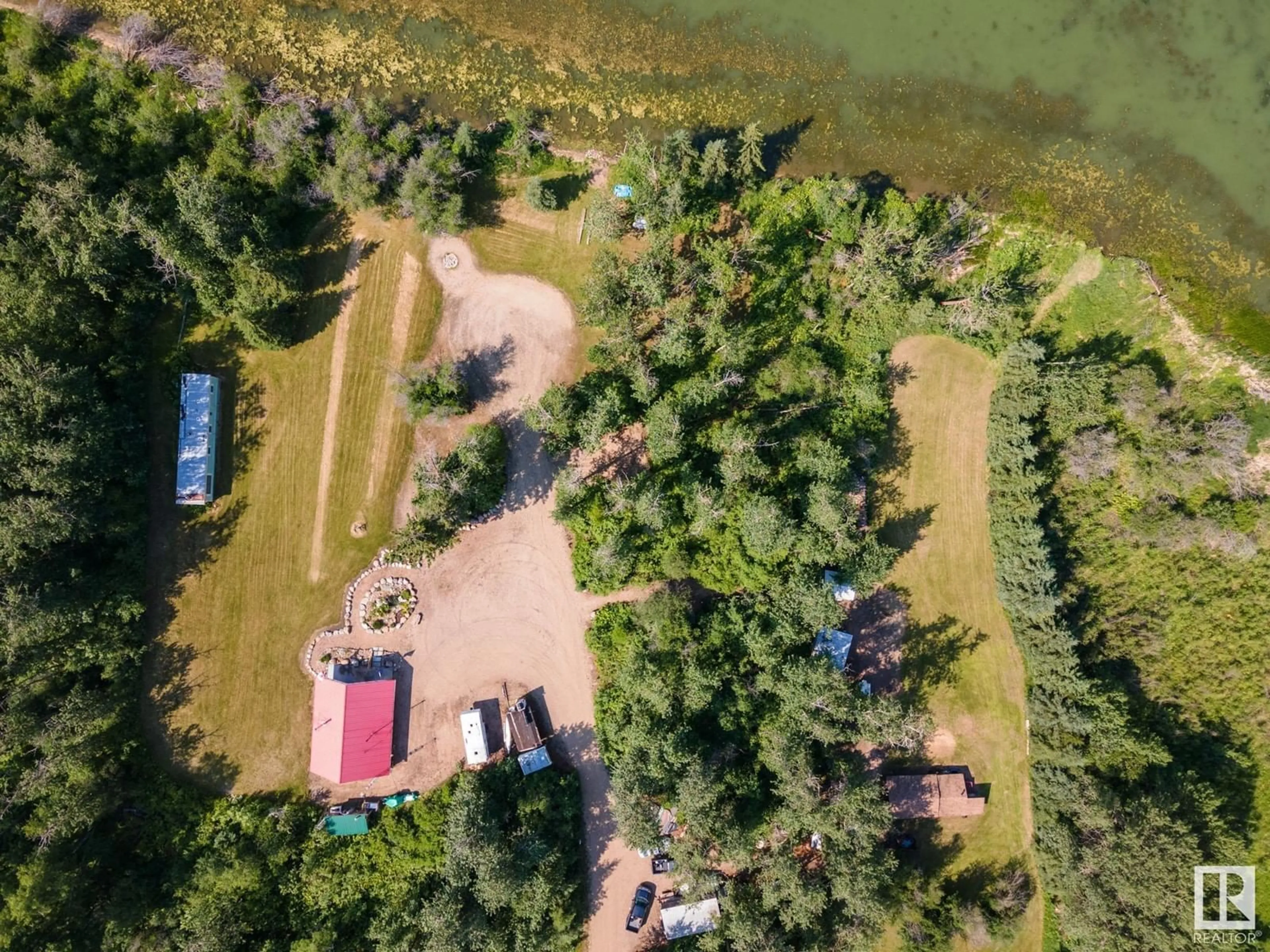 A pic from outside/outdoor area/front of a property/back of a property/a pic from drone, water/lake/river/ocean view for A - 58227 RNG RD 70, Rural St. Paul County Alberta T0A0G1