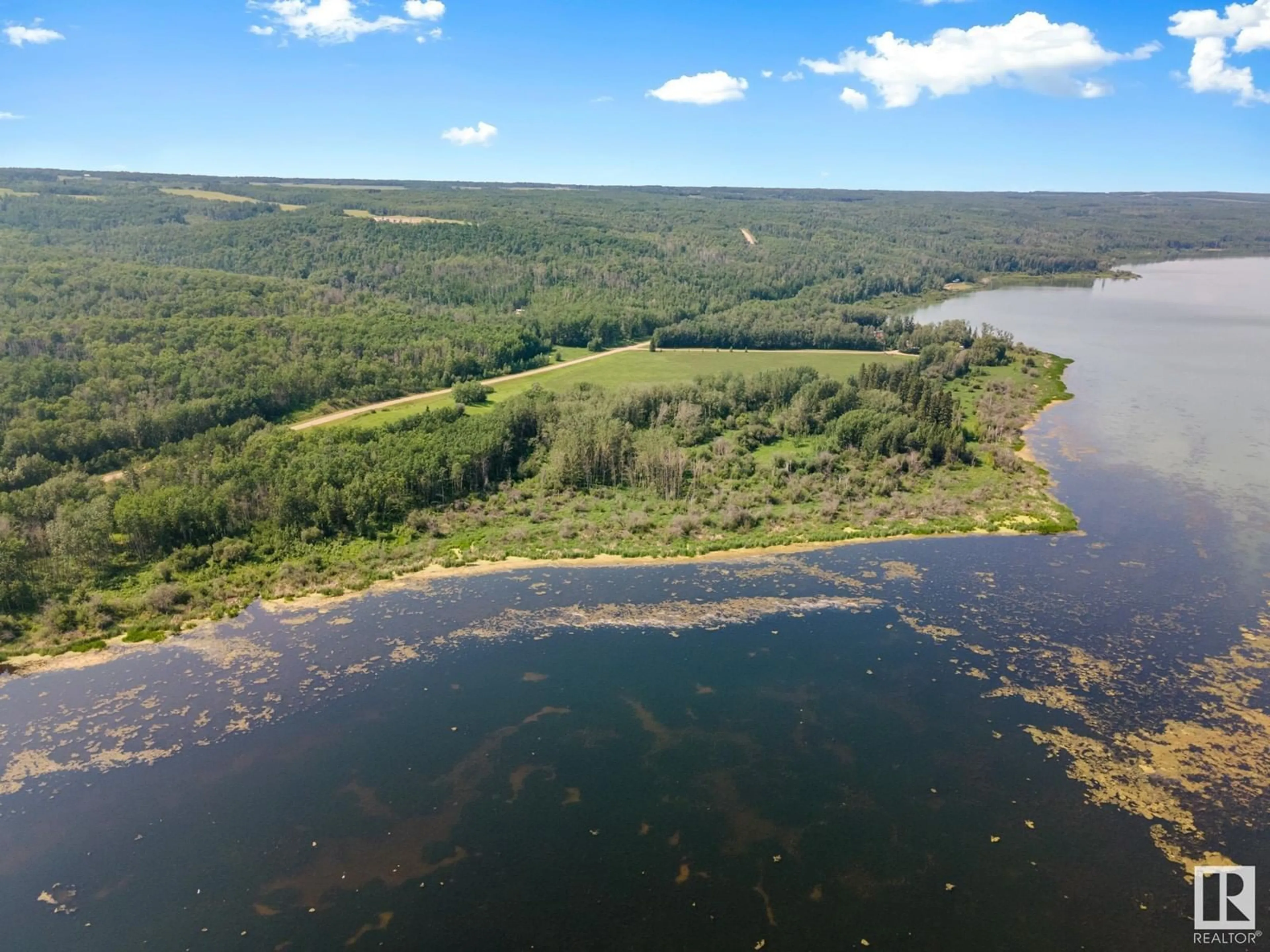 A pic from outside/outdoor area/front of a property/back of a property/a pic from drone, water/lake/river/ocean view for A - 58227 RNG RD 70, Rural St. Paul County Alberta T0A0G1
