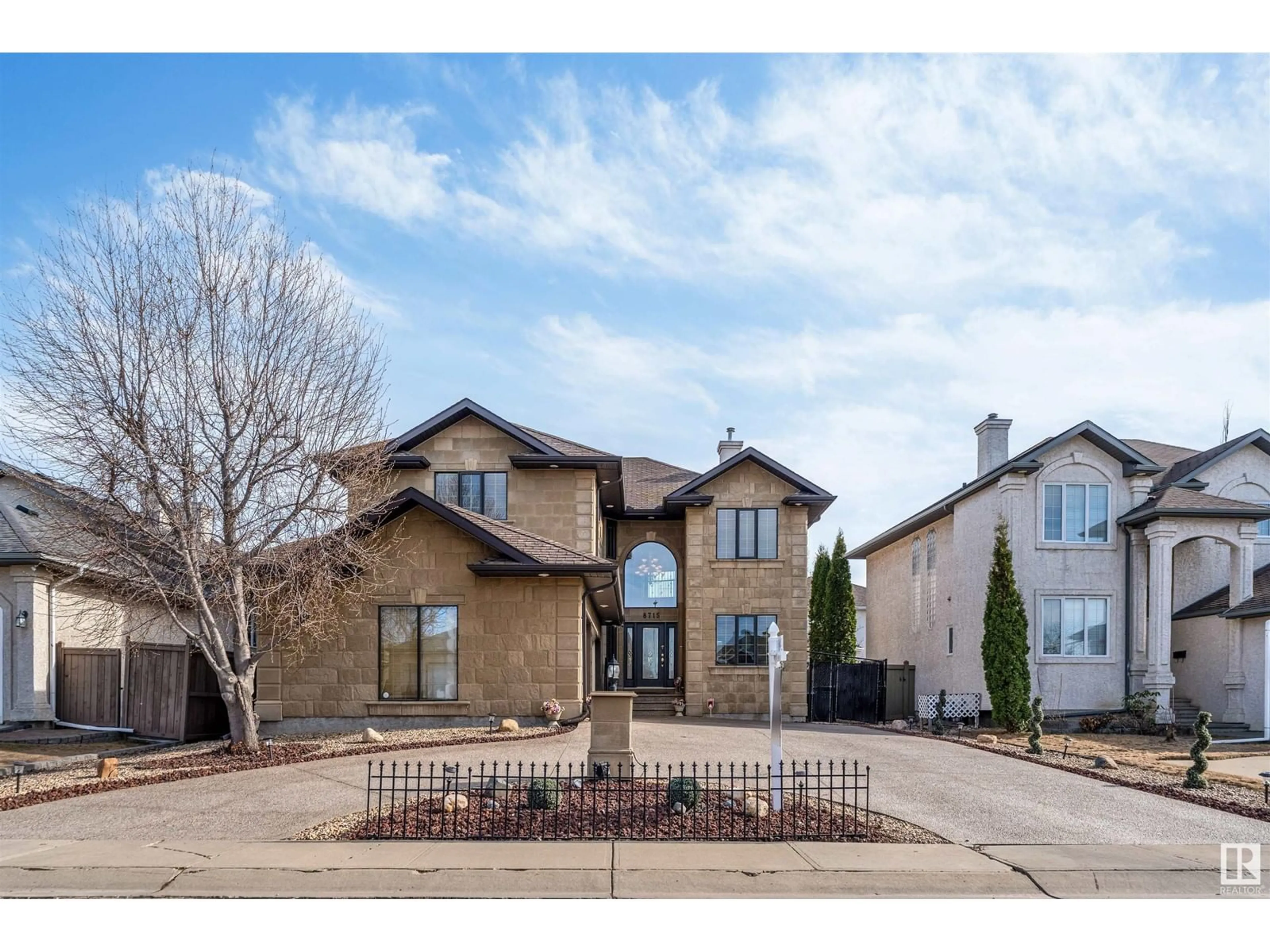 Home with brick exterior material, street for 8715 160A AV NW, Edmonton Alberta T5Z3K4