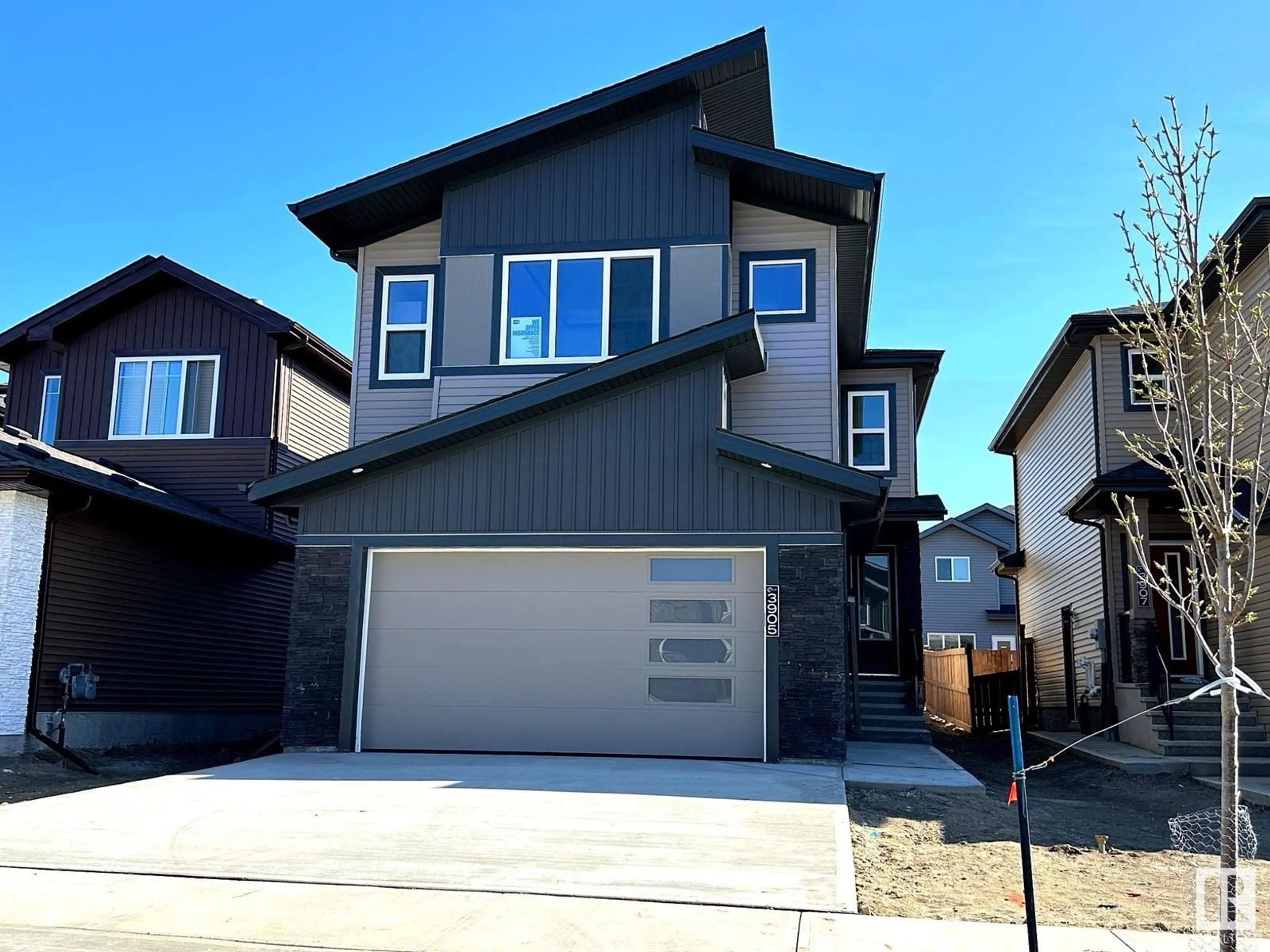 Home with vinyl exterior material, street for 3905 41 AV, Beaumont Alberta T4X3B5
