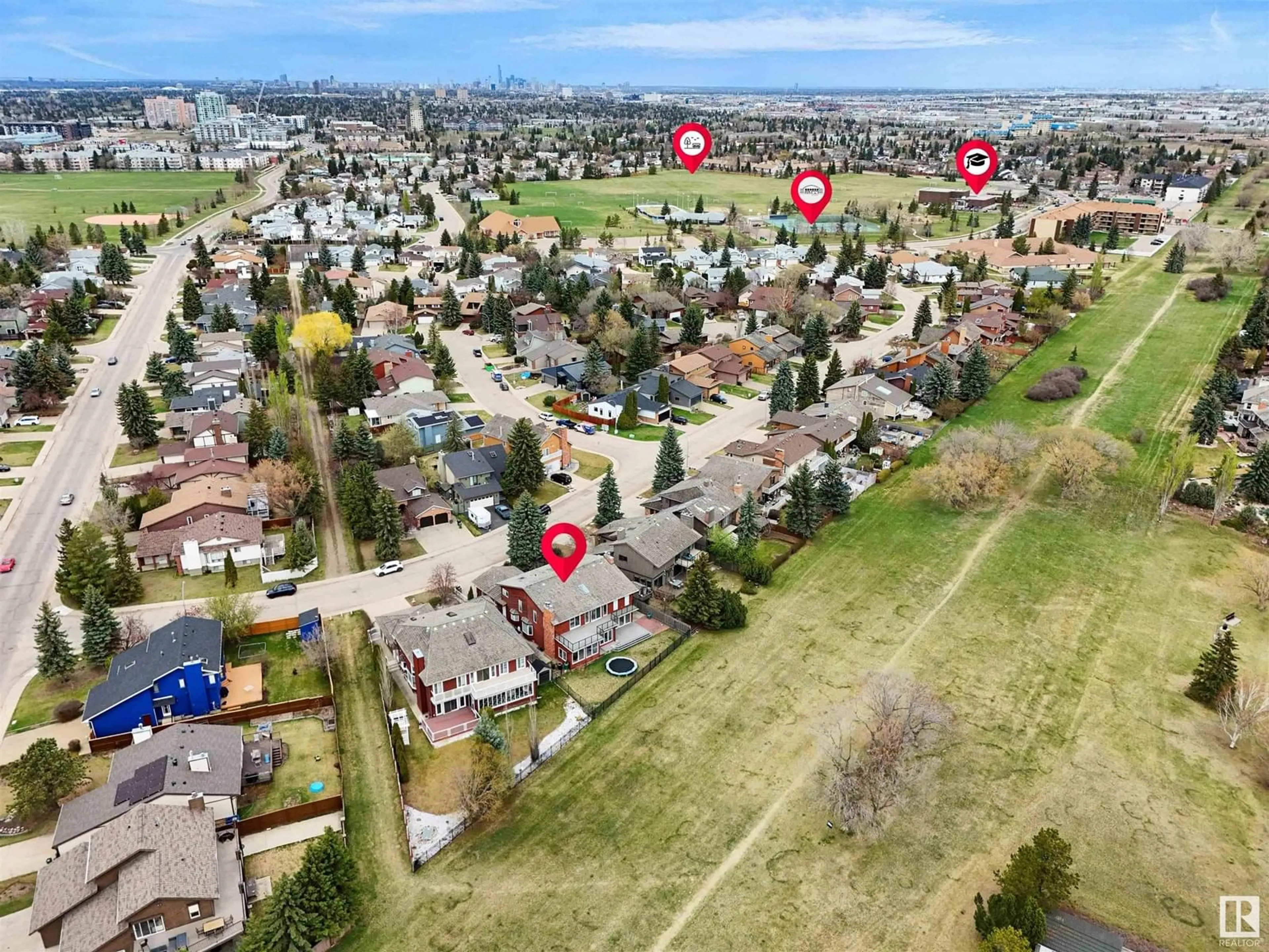 A pic from outside/outdoor area/front of a property/back of a property/a pic from drone, street for 10815 BEARSPAW E NW, Edmonton Alberta T6J5E1