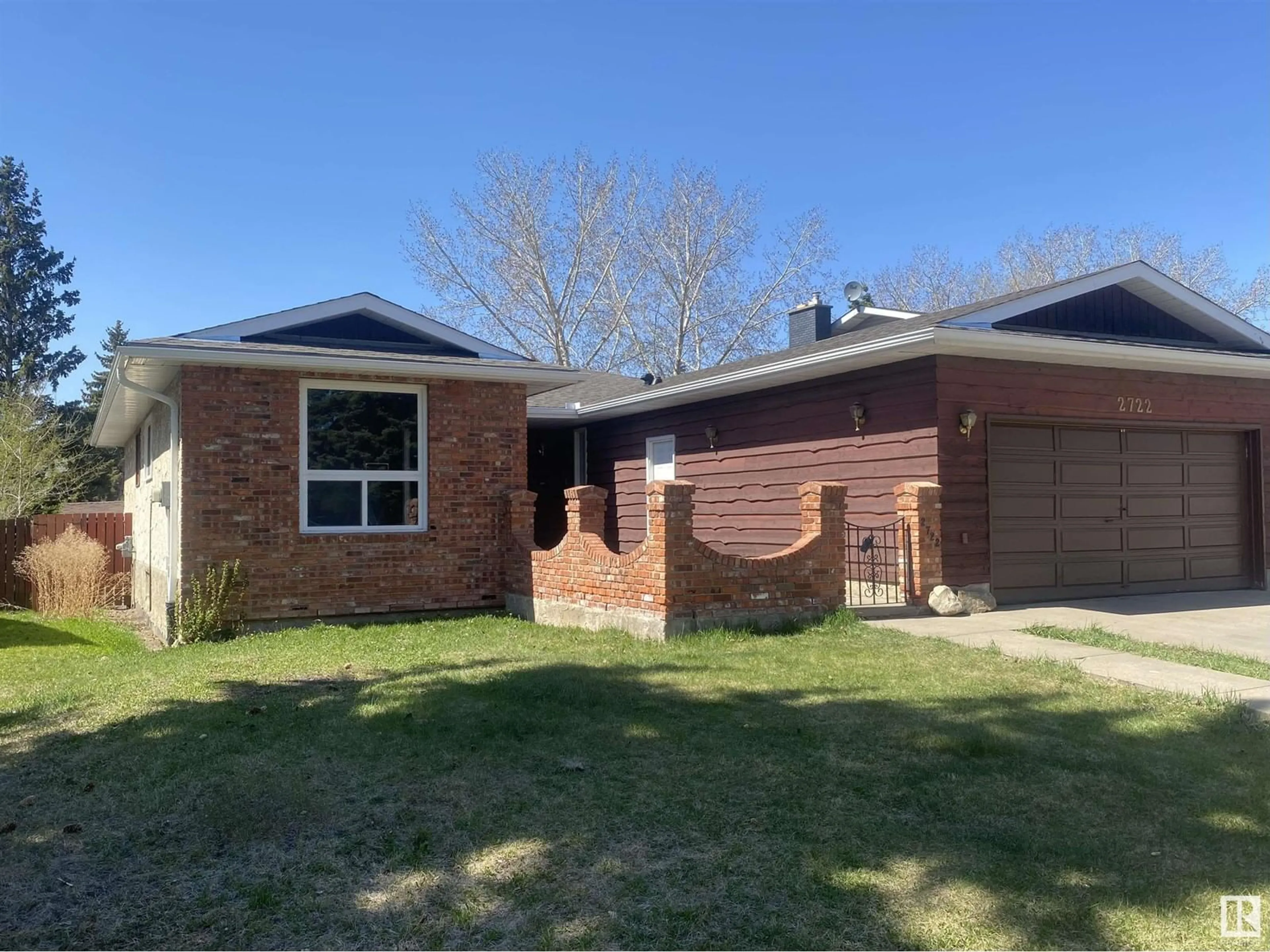 Home with brick exterior material, street for NW - 2722 104A ST, Edmonton Alberta T6J4C3