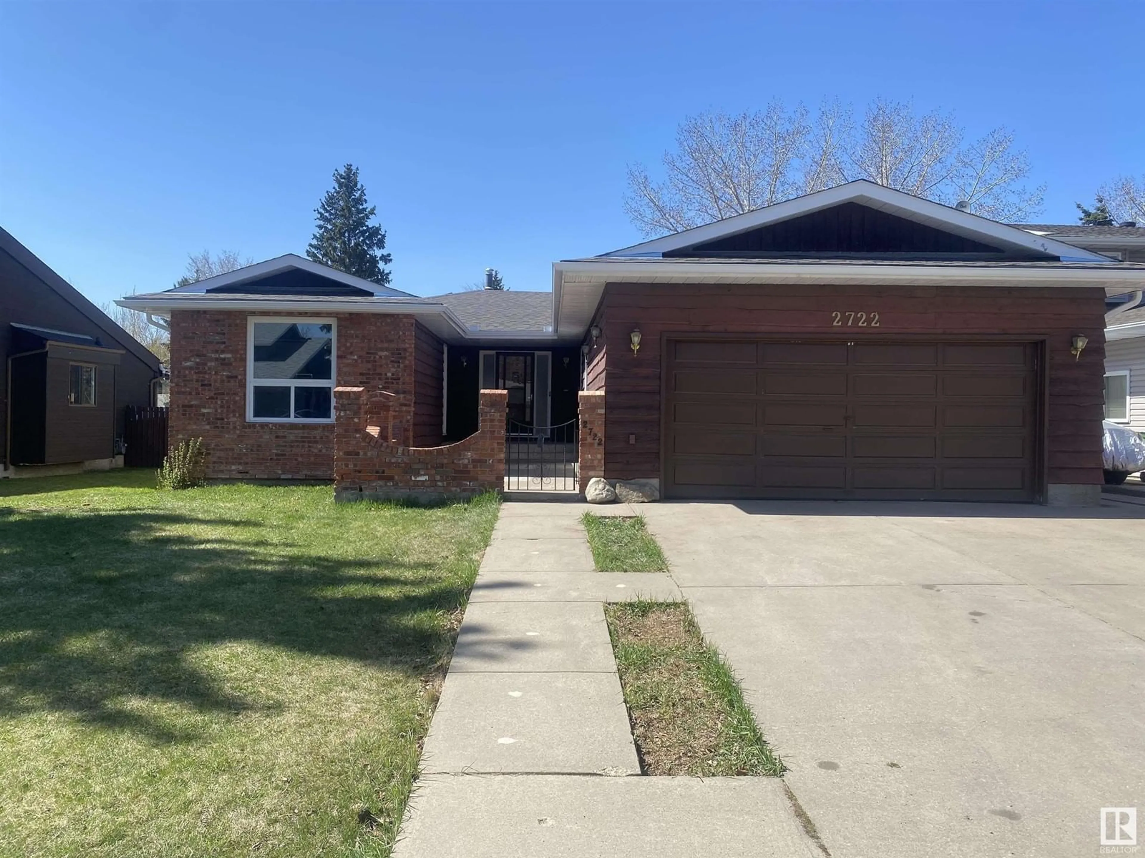Home with brick exterior material, street for NW - 2722 104A ST, Edmonton Alberta T6J4C3