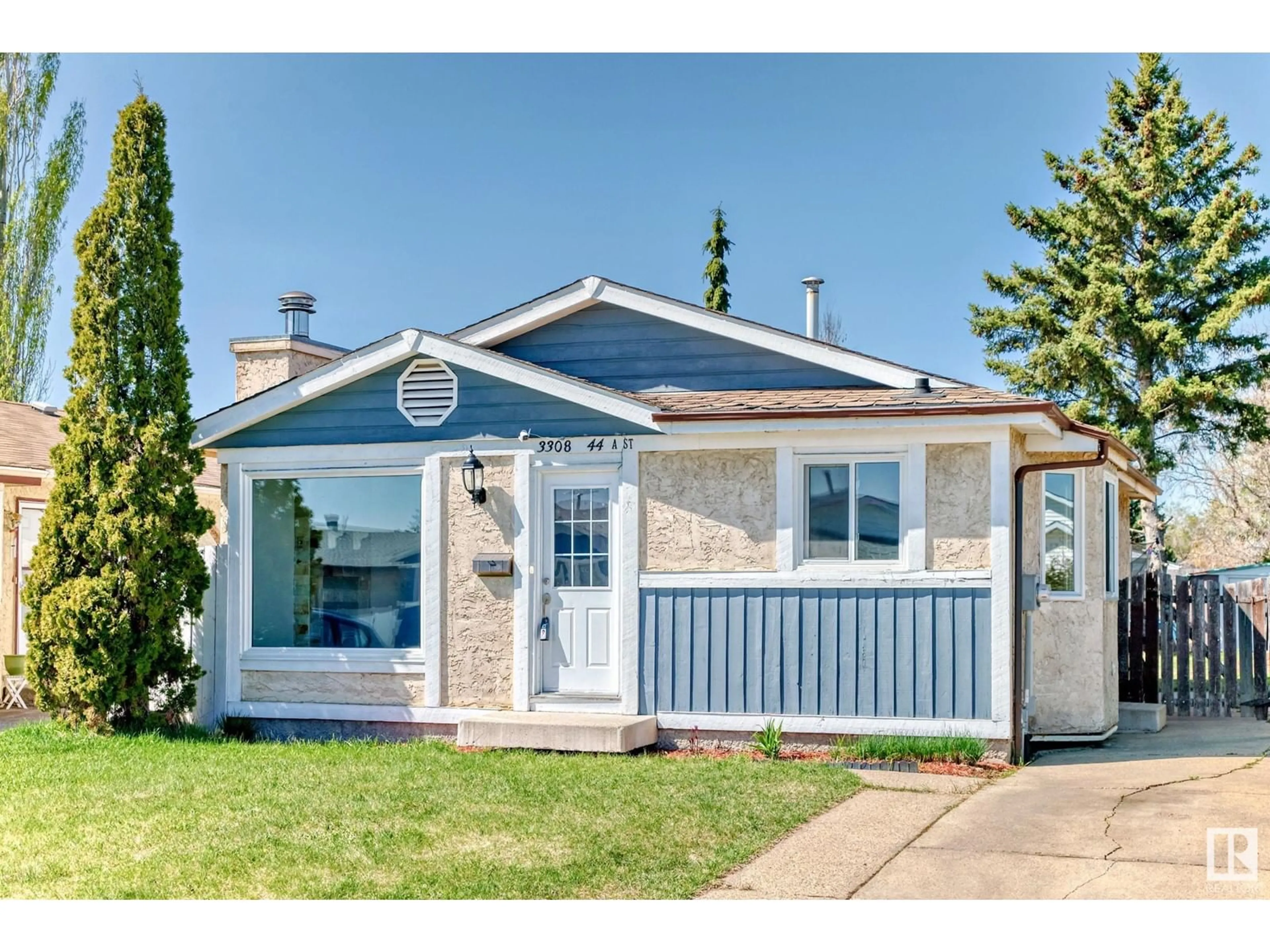 Home with vinyl exterior material, street for 3308 44A ST, Edmonton Alberta T6L4W9