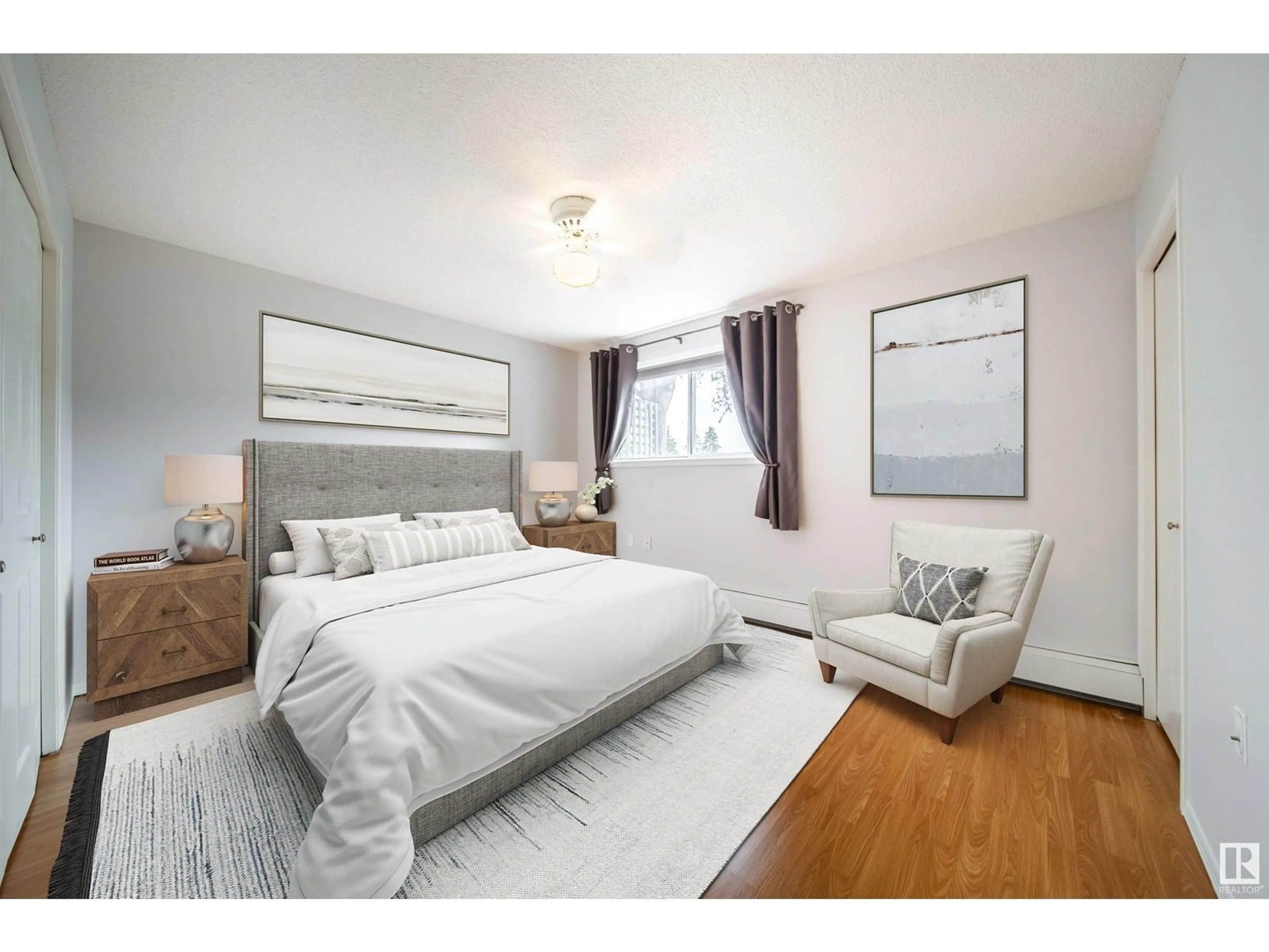 Bedroom with bed, wood/laminate floor for 101 15503 106 ST NW, Edmonton Alberta T5X5W7