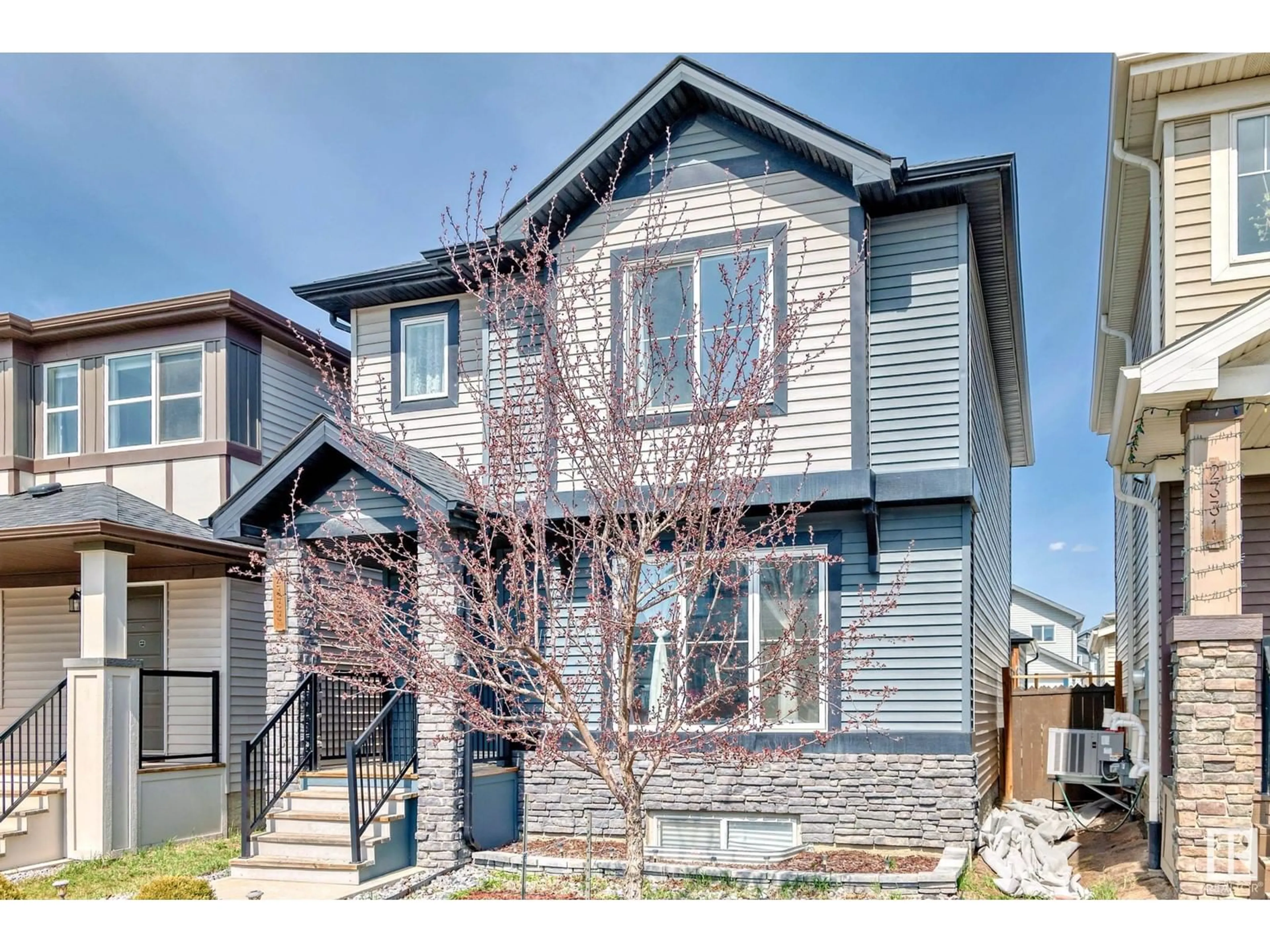 Home with vinyl exterior material, street for 2333 CASEY CR, Edmonton Alberta T6W3M9