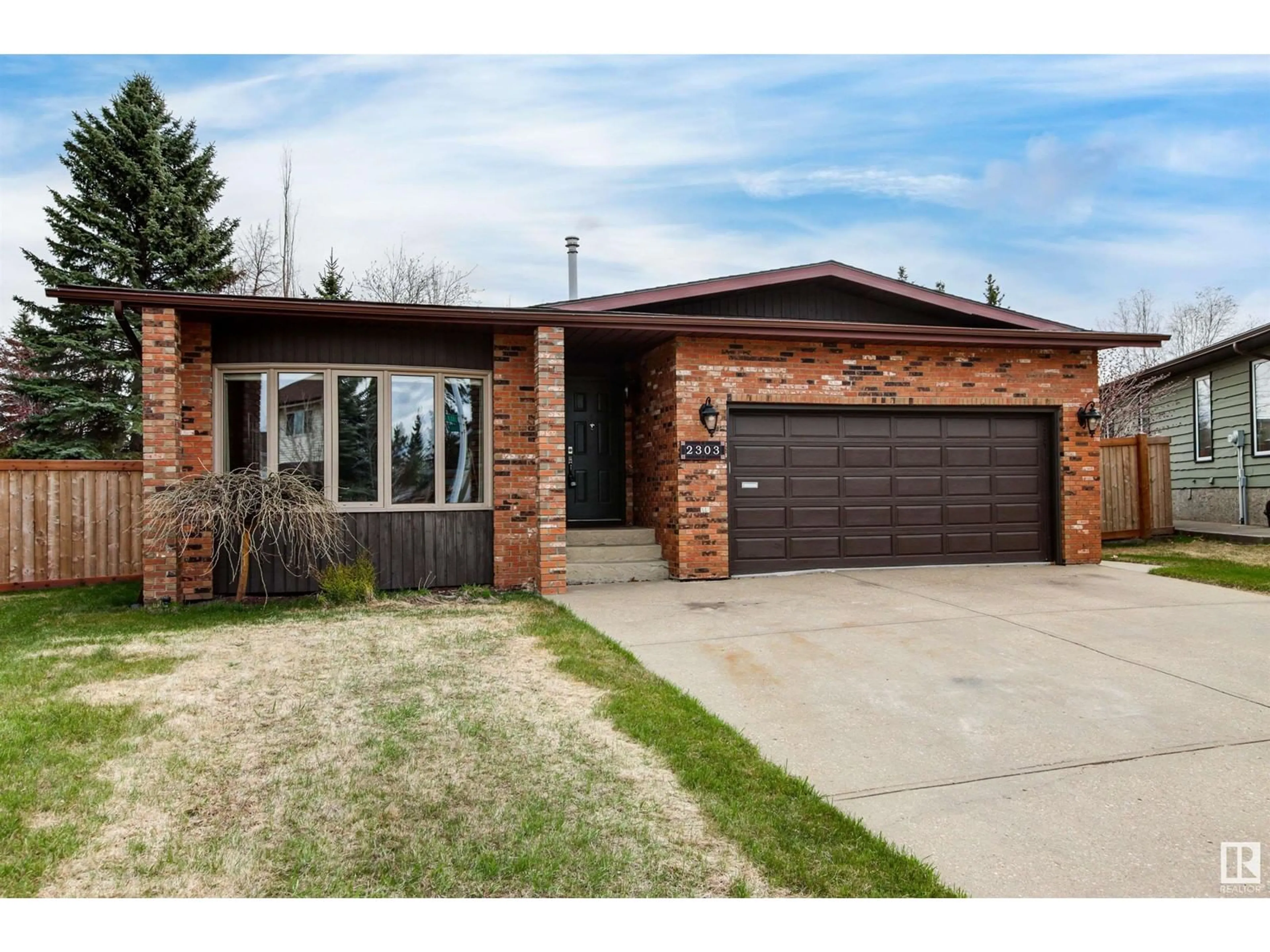 Home with brick exterior material, street for 2303 112A ST, Edmonton Alberta T6J4X6