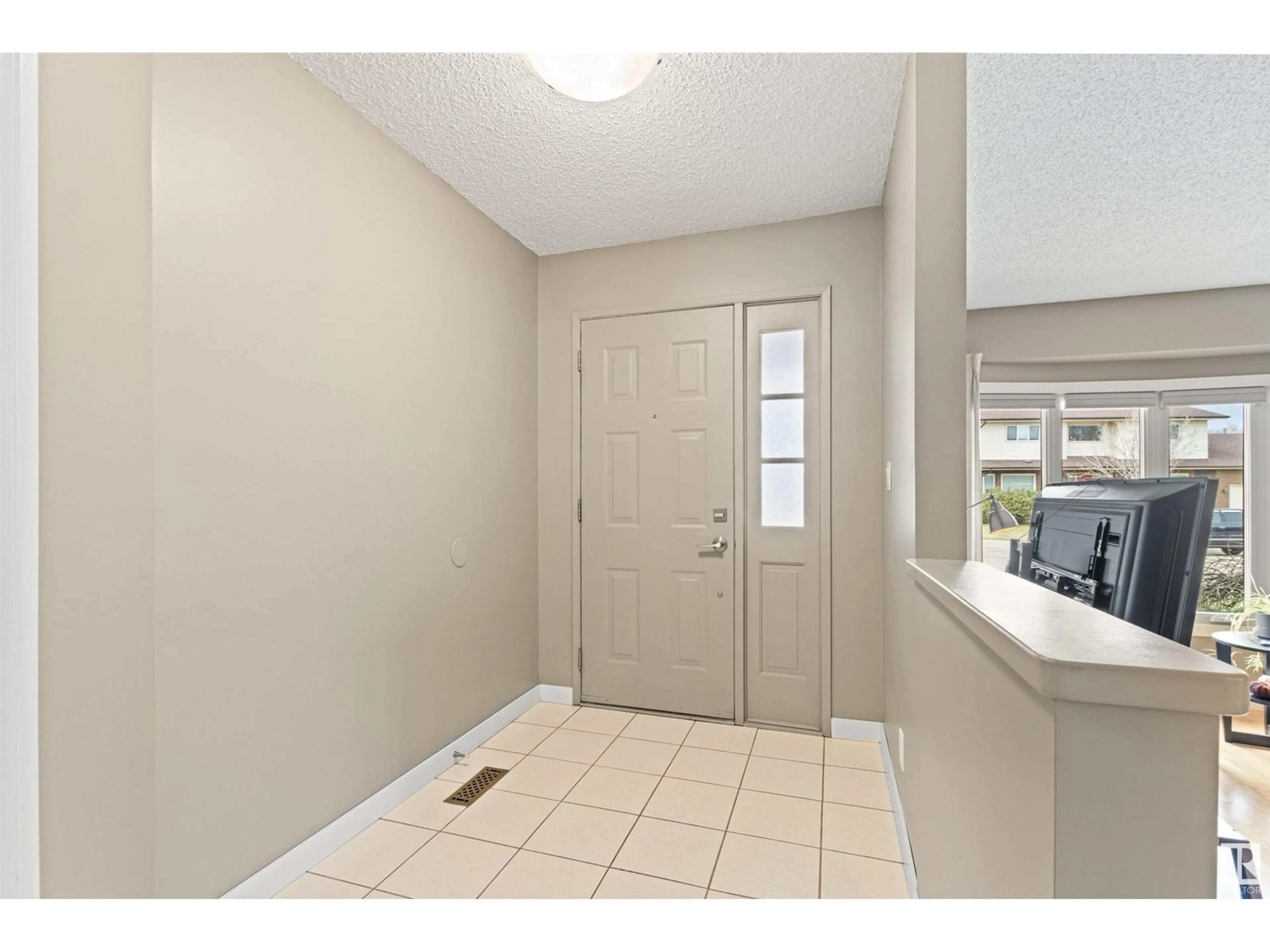 Indoor entryway for 2303 112A ST, Edmonton Alberta T6J4X6