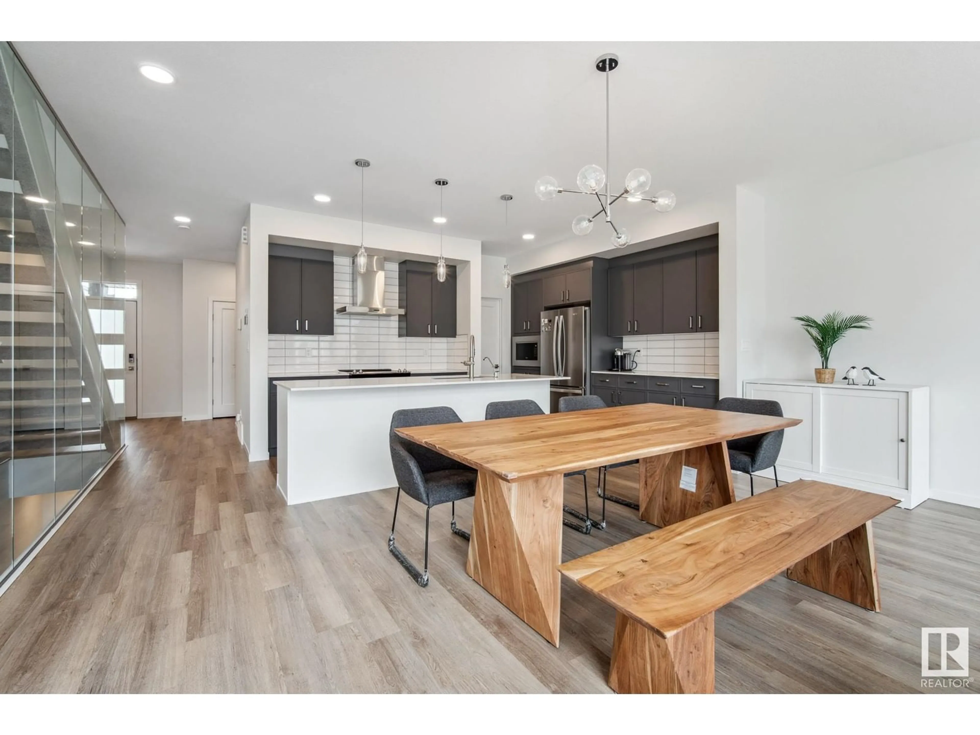 Open concept kitchen, wood/laminate floor for SW - 3474 KULAY GREEN GR, Edmonton Alberta T6W5J7