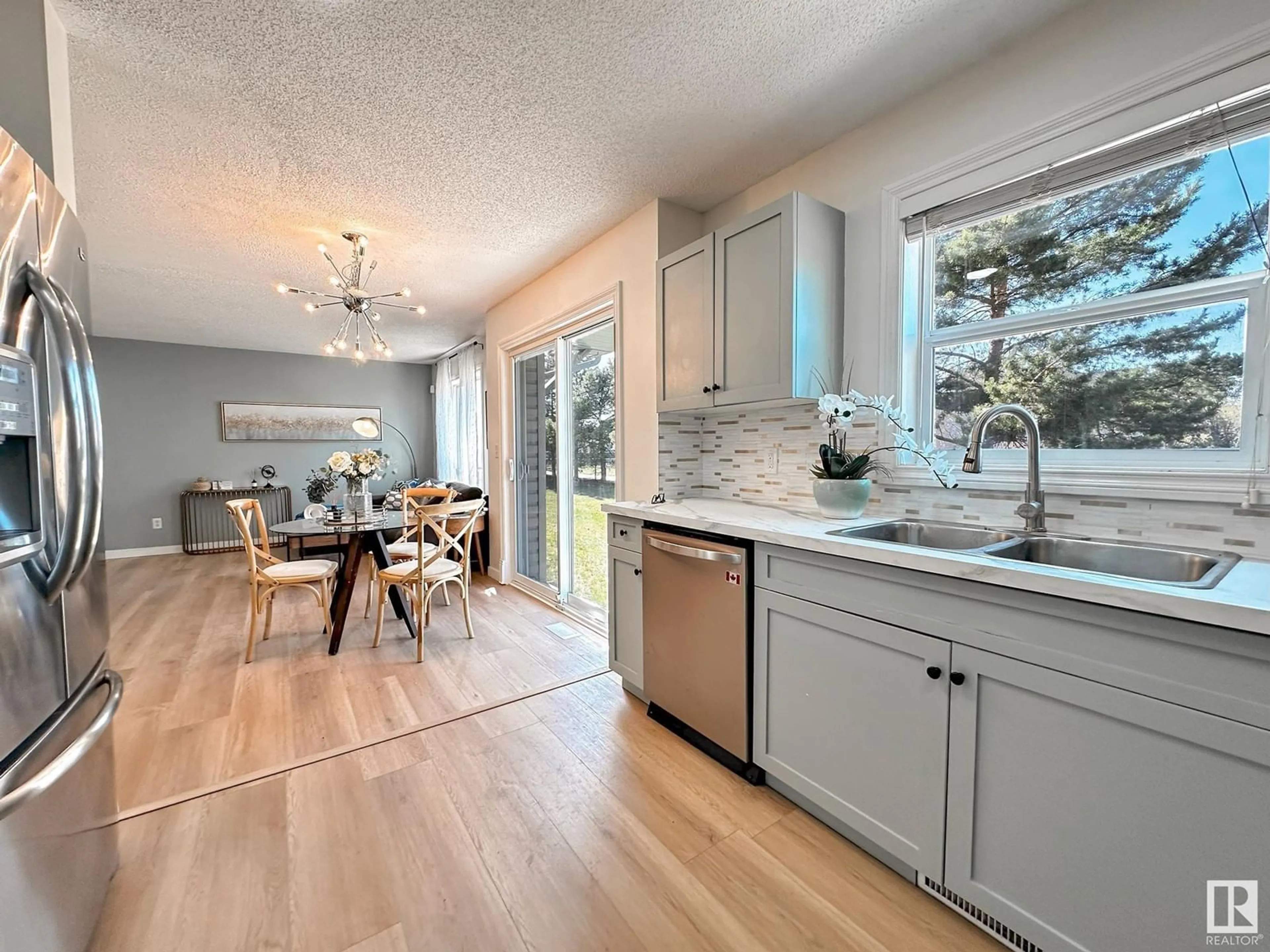 Open concept kitchen, unknown for #124 - 12050 17 AV, Edmonton Alberta T6W1X4
