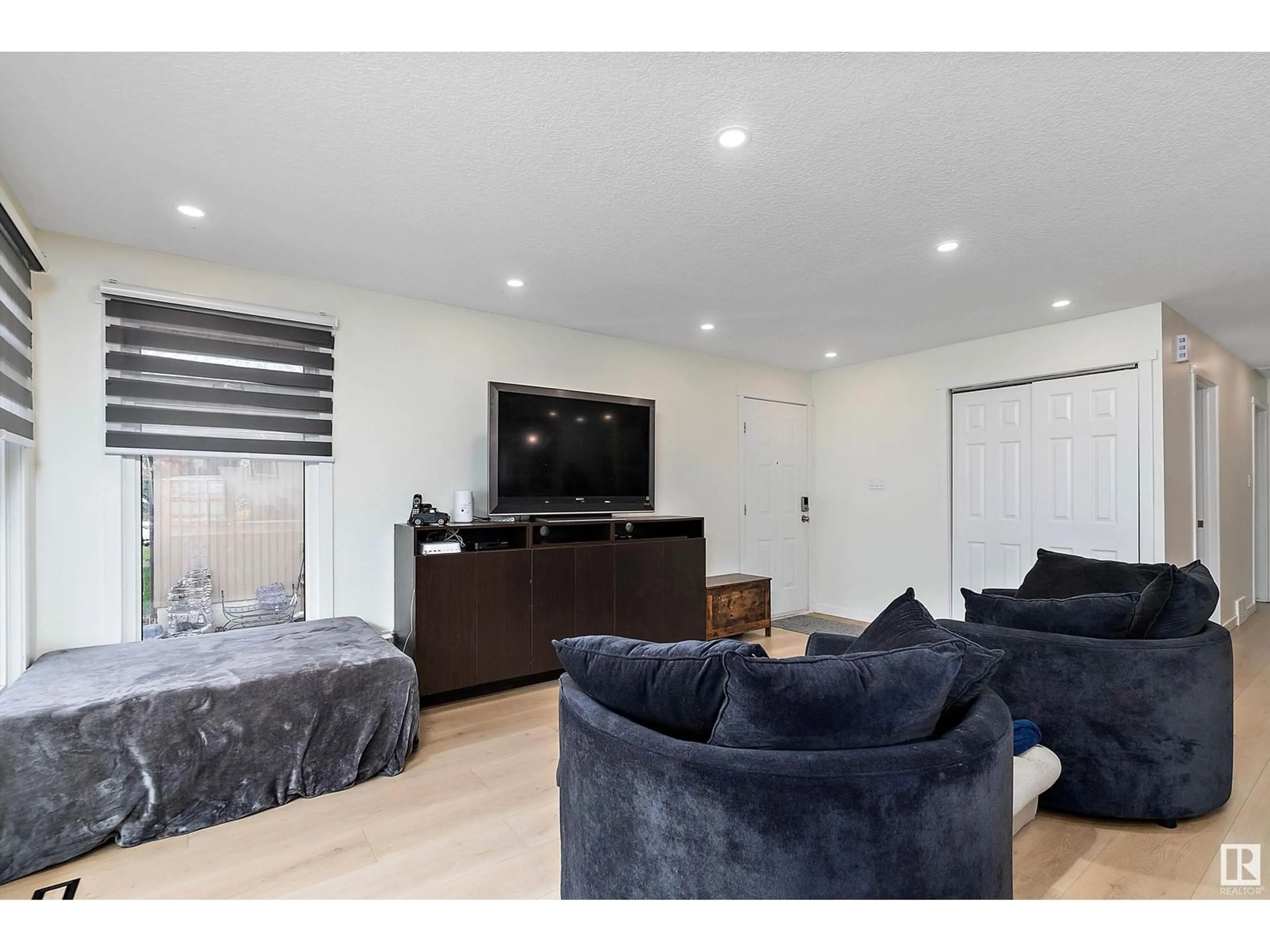 Living room with furniture, unknown for 13828 28 ST, Edmonton Alberta T5Y1A7