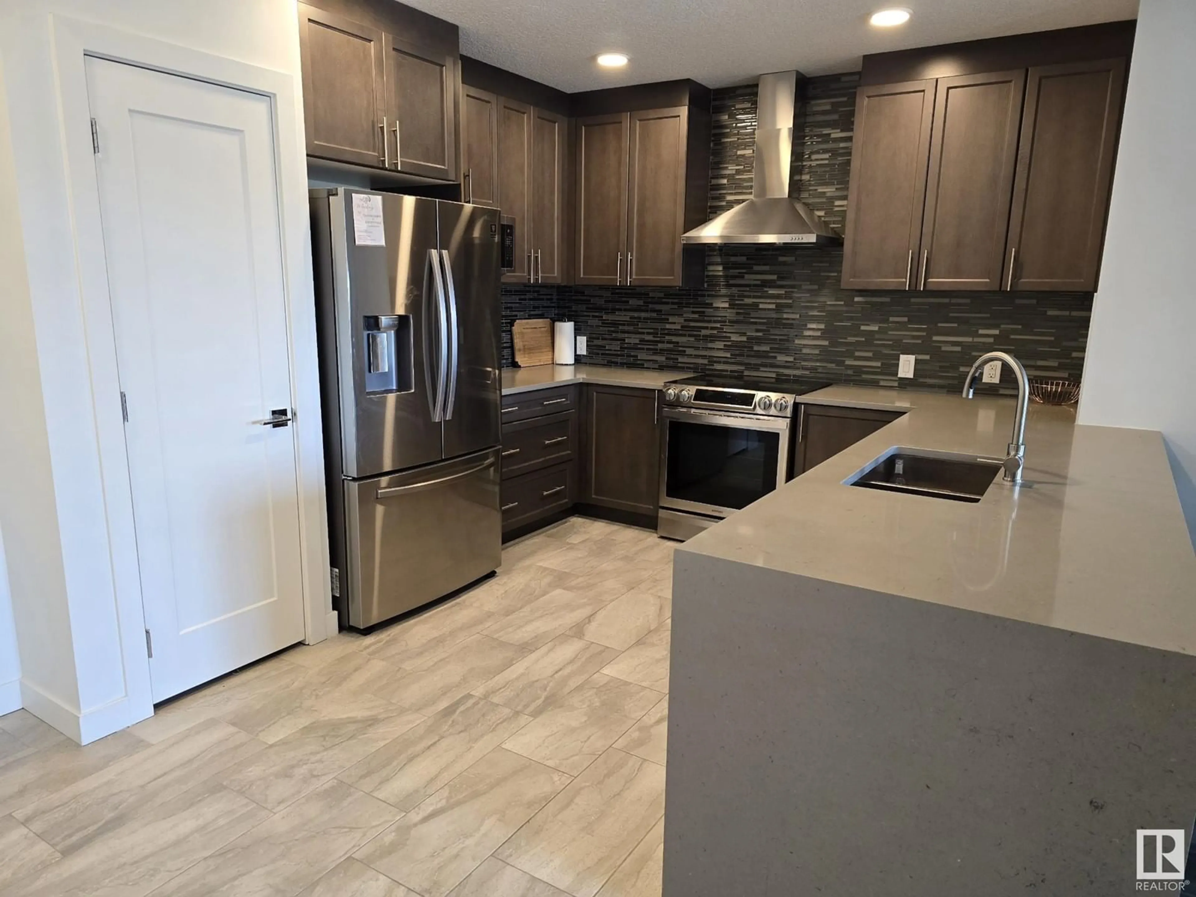 Open concept kitchen, ceramic/tile floor for #206 - 1316 WINDERMERE WY, Edmonton Alberta T6W0P1