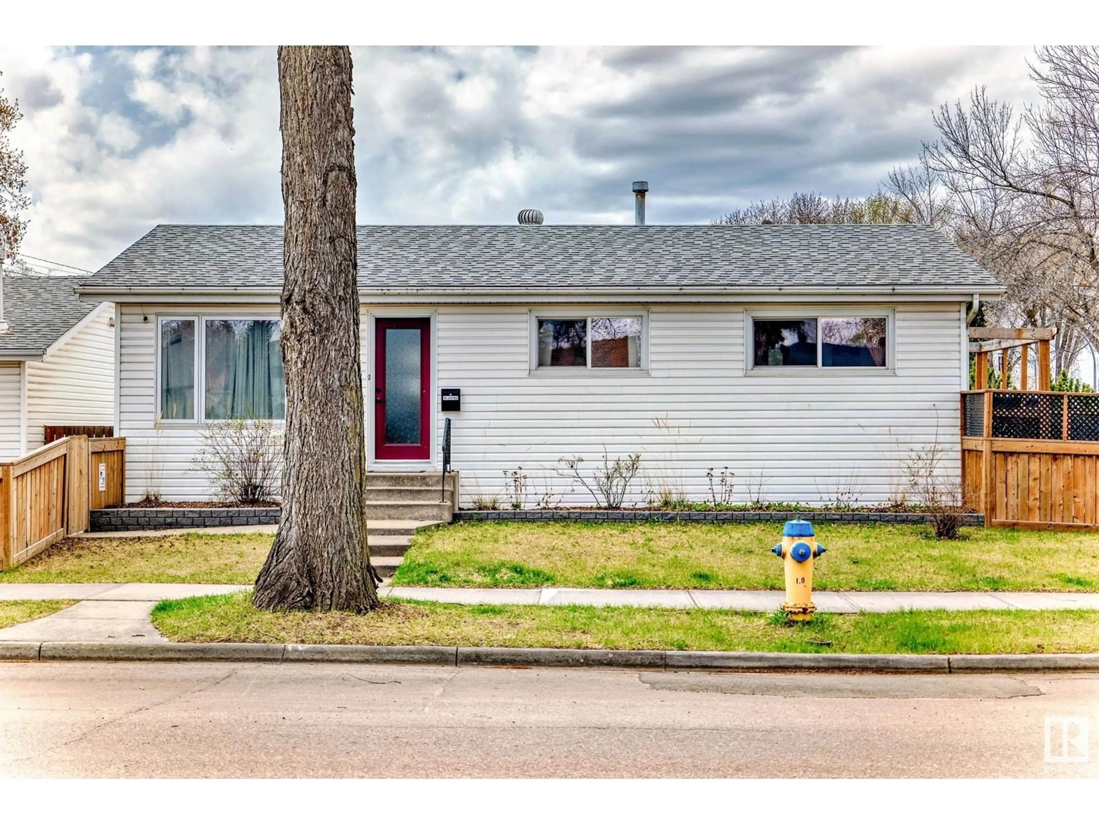 Home with vinyl exterior material, street for 11052 151 ST, Edmonton Alberta T5P1W3