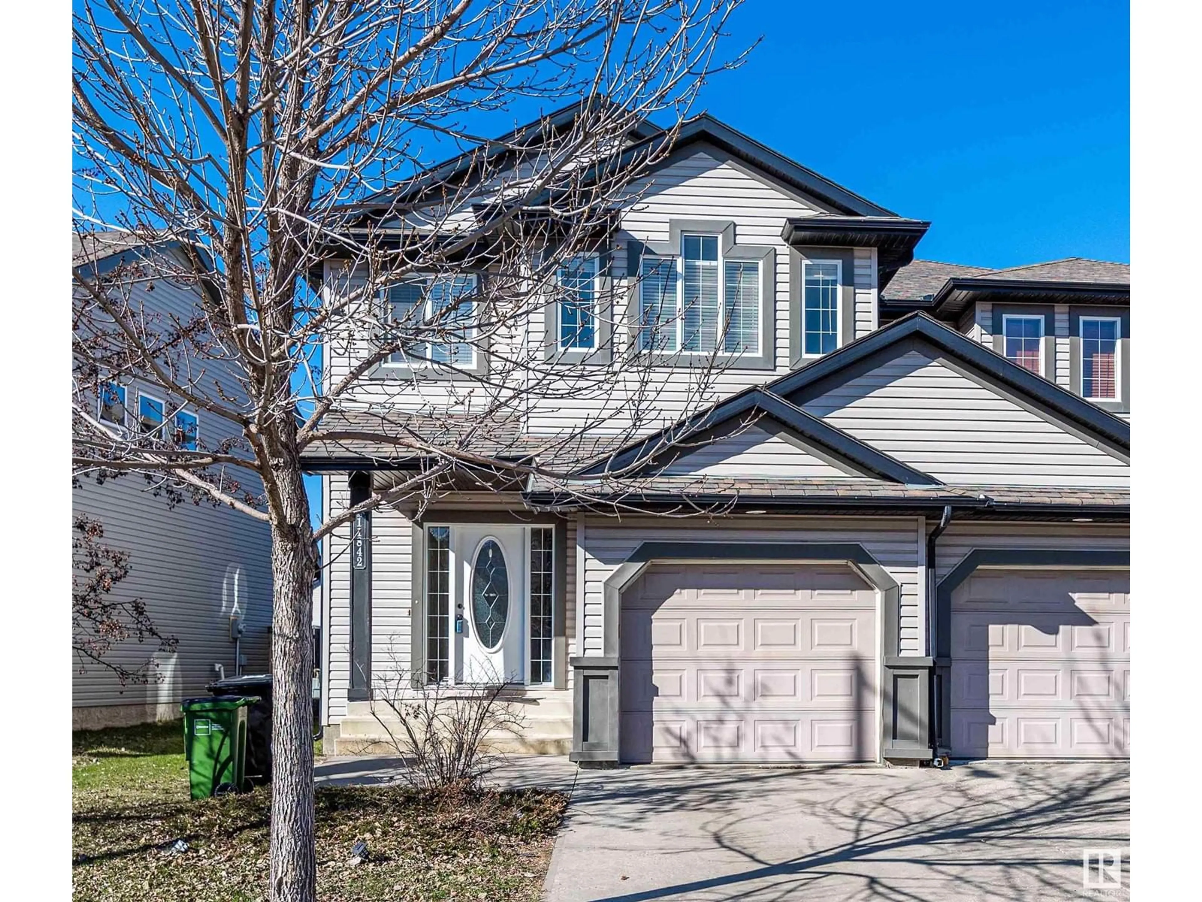 Home with vinyl exterior material, street for SW - 11842 21 AV, Edmonton Alberta T6W0C9