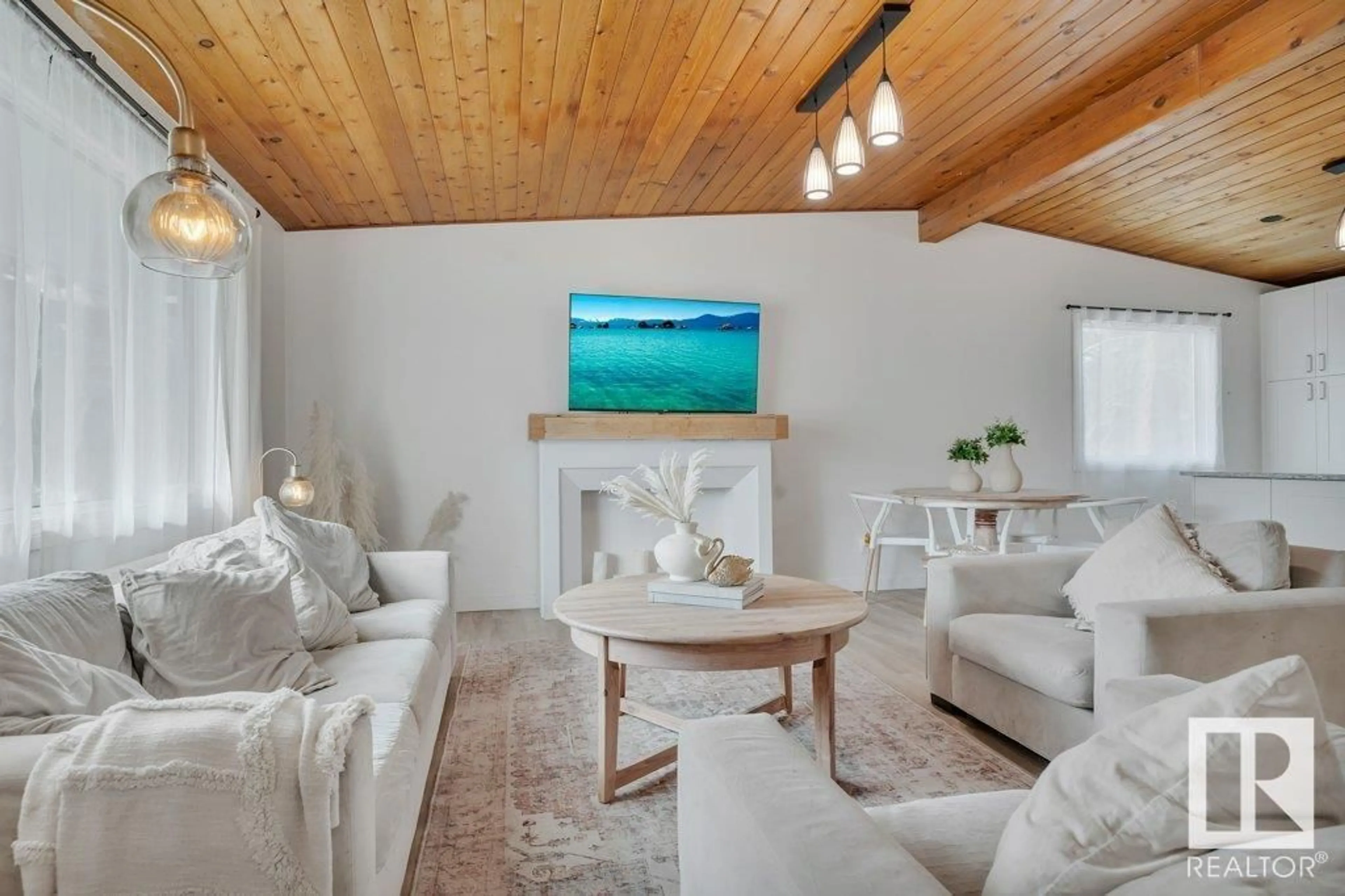 Living room with furniture, wood/laminate floor for 20 APPLEWOOD RD, Sherwood Park Alberta T8A0L3