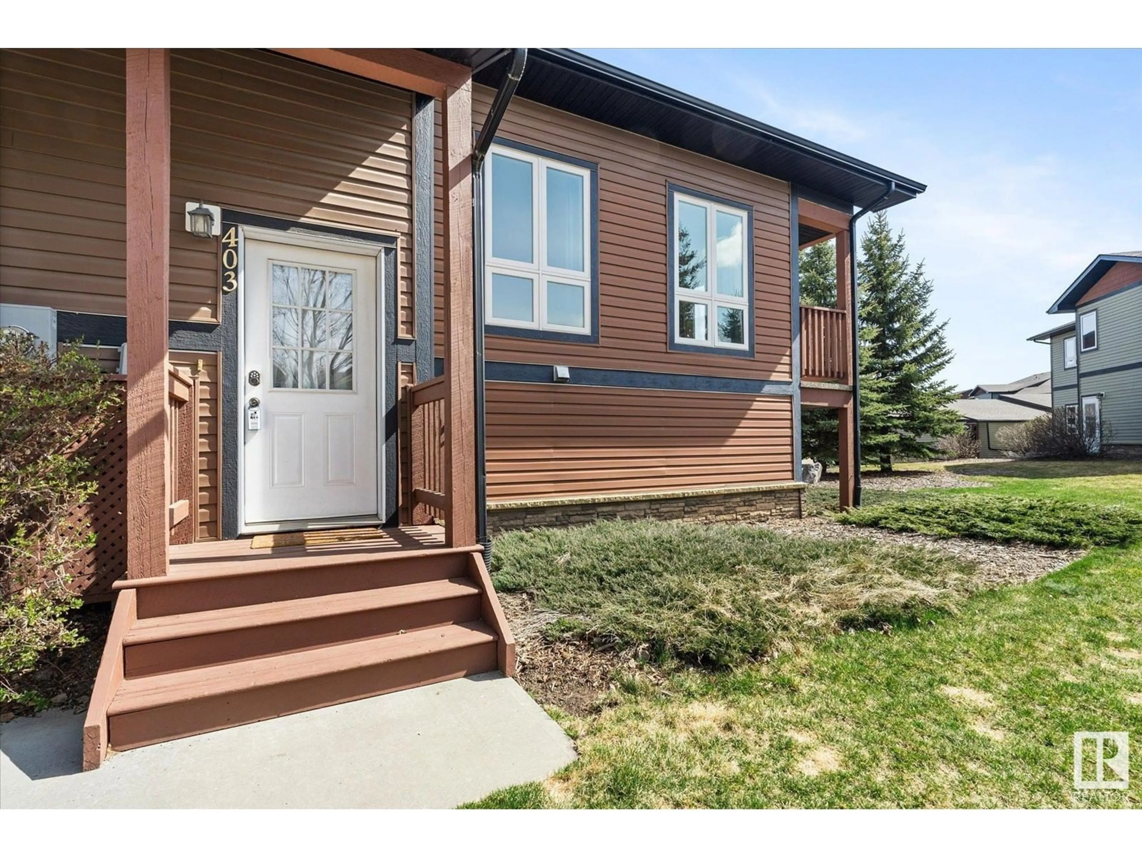 Home with vinyl exterior material, street for 403 GRAYBRIAR GREENS, Stony Plain Alberta T7Z0G1