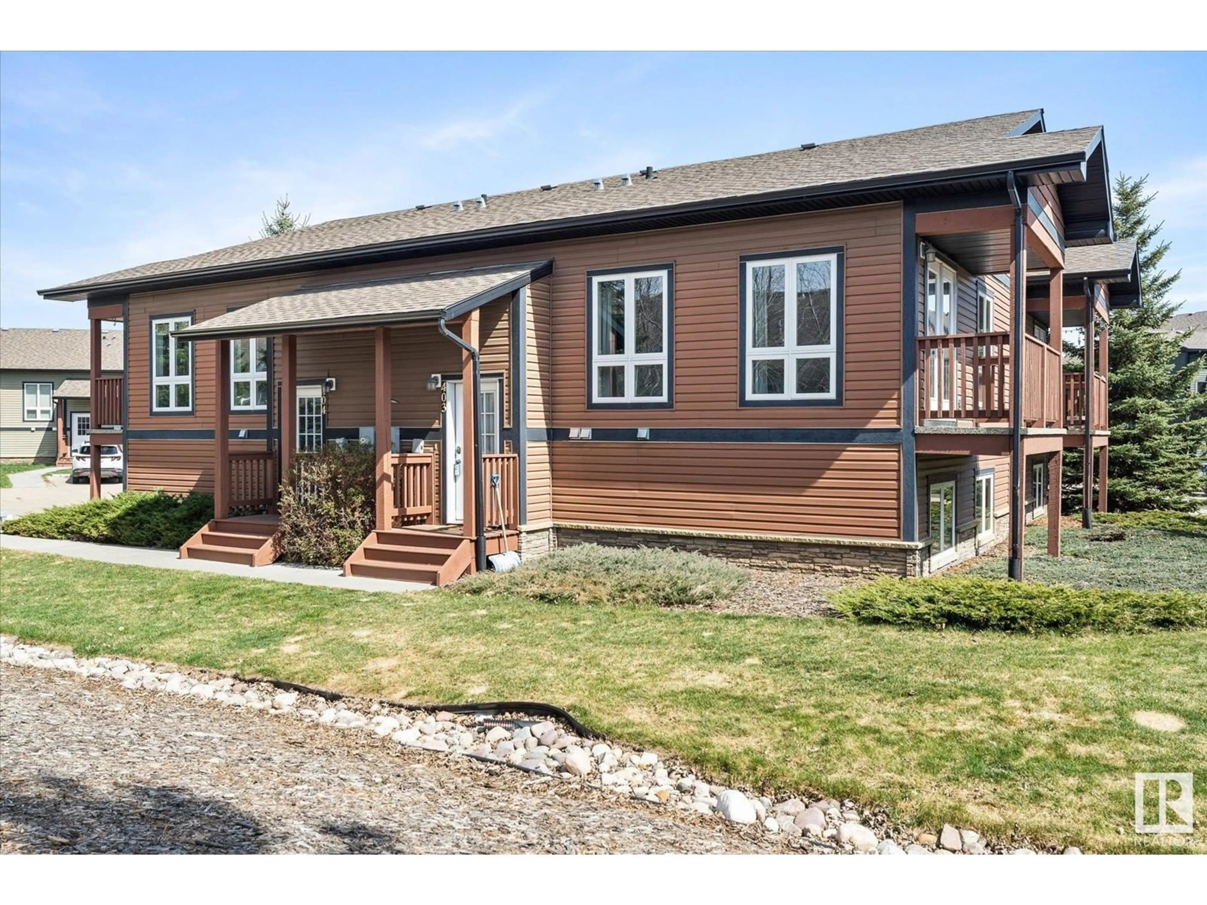 Home with vinyl exterior material, street for 403 GRAYBRIAR GREENS, Stony Plain Alberta T7Z0G1