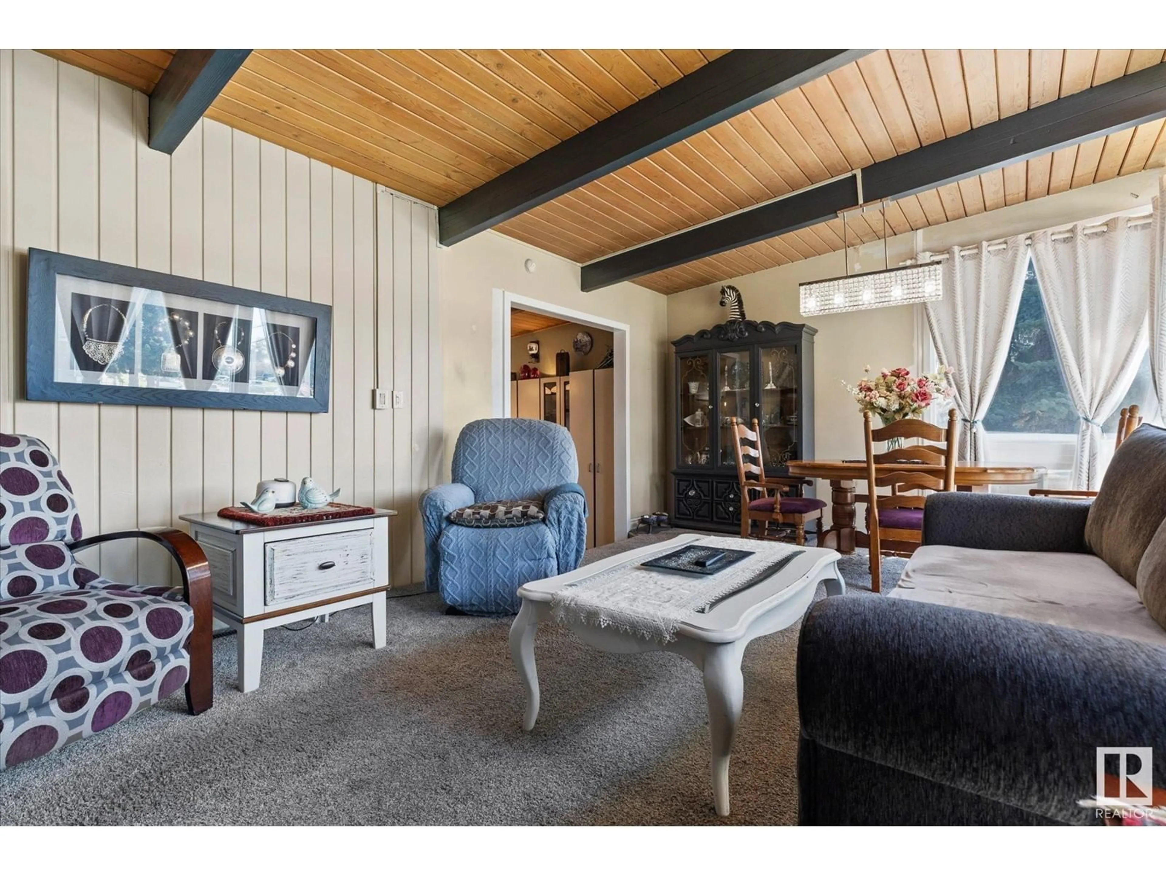 Living room with furniture, wood/laminate floor for 215 JESPERSEN AV, Spruce Grove Alberta T7X2J1