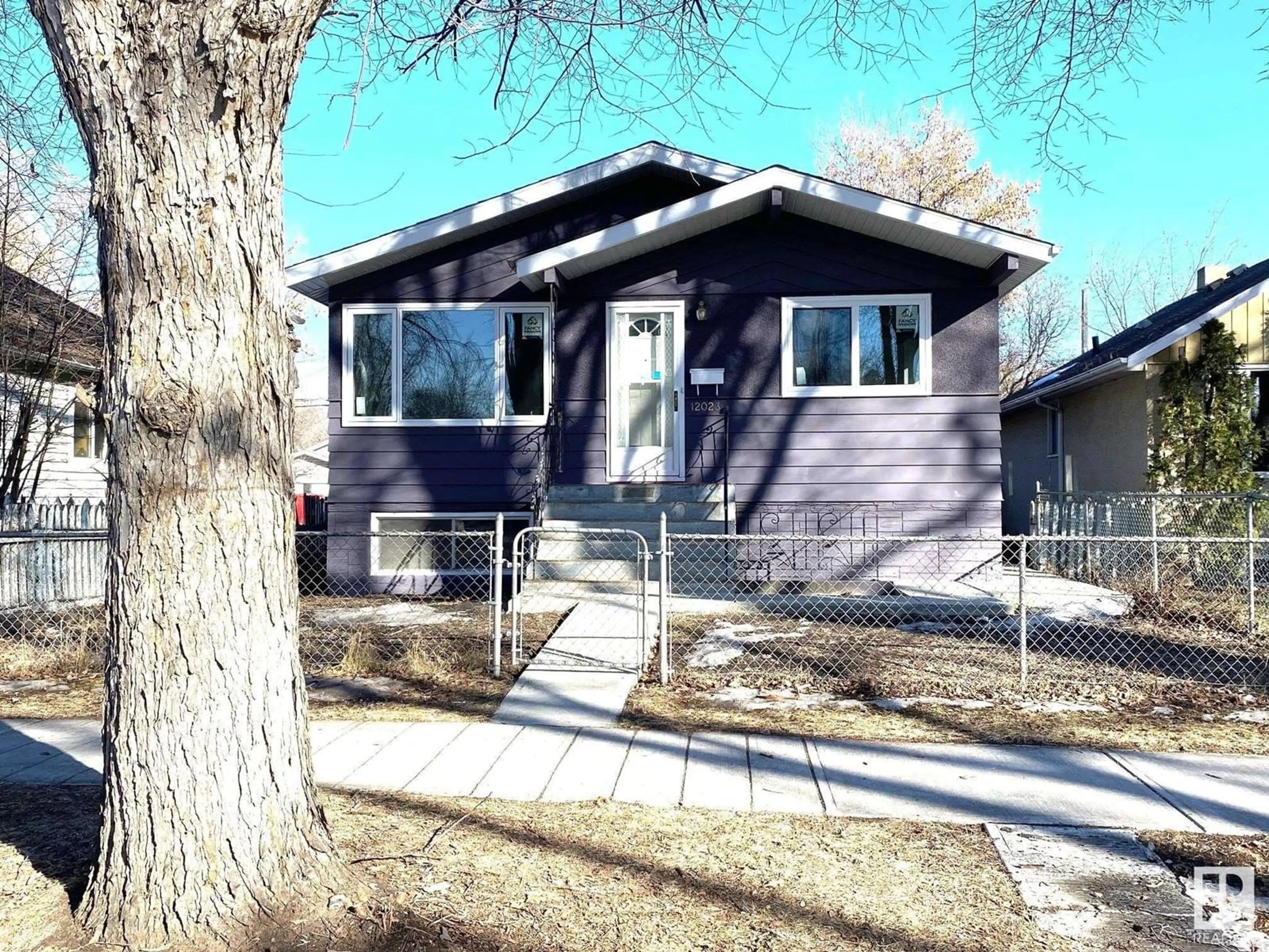 Home with vinyl exterior material, street for NW - 12023 93 ST, Edmonton Alberta T5G1G7