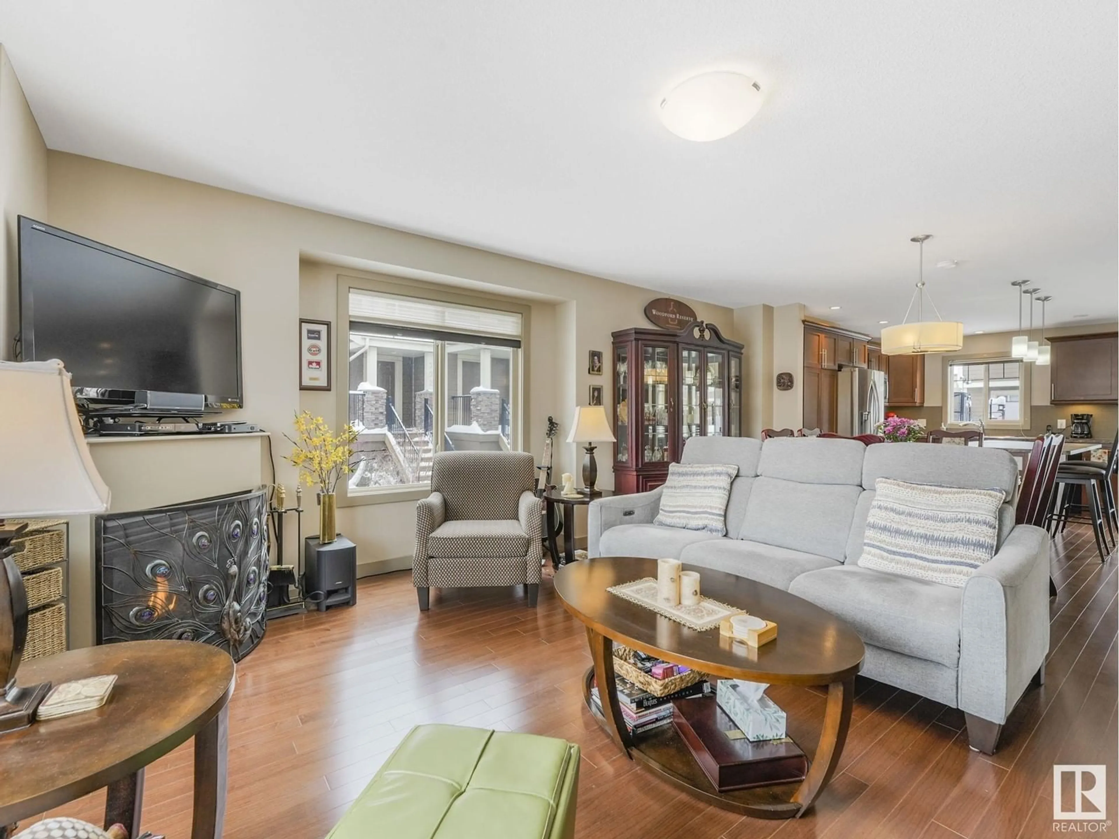 Living room with furniture, wood/laminate floor for 904 - 401 PALISADES WY, Sherwood Park Alberta T8H0R7