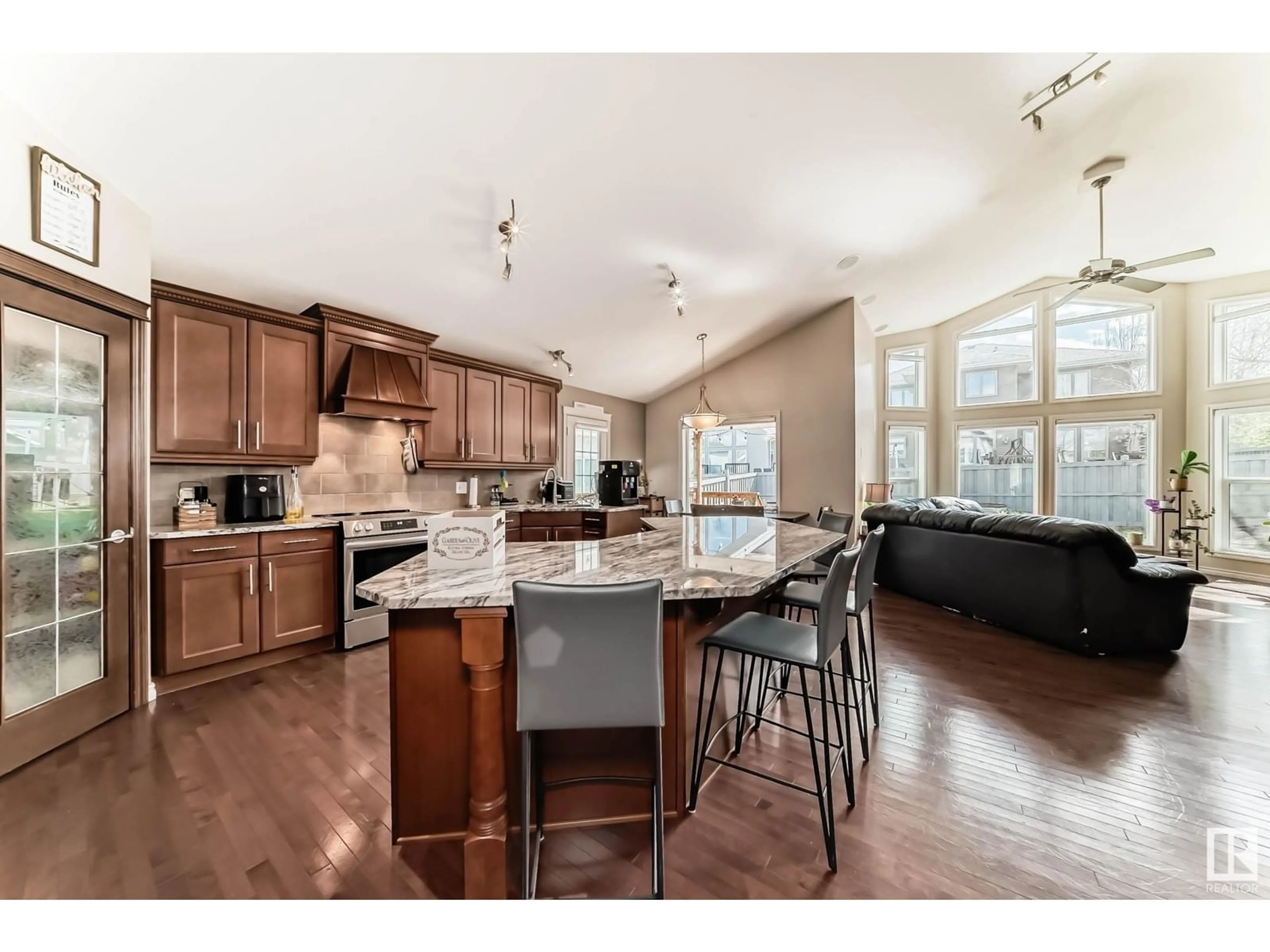 Open concept kitchen, wood/laminate floor for 1075 HOPE RD, Edmonton Alberta T6M0G2