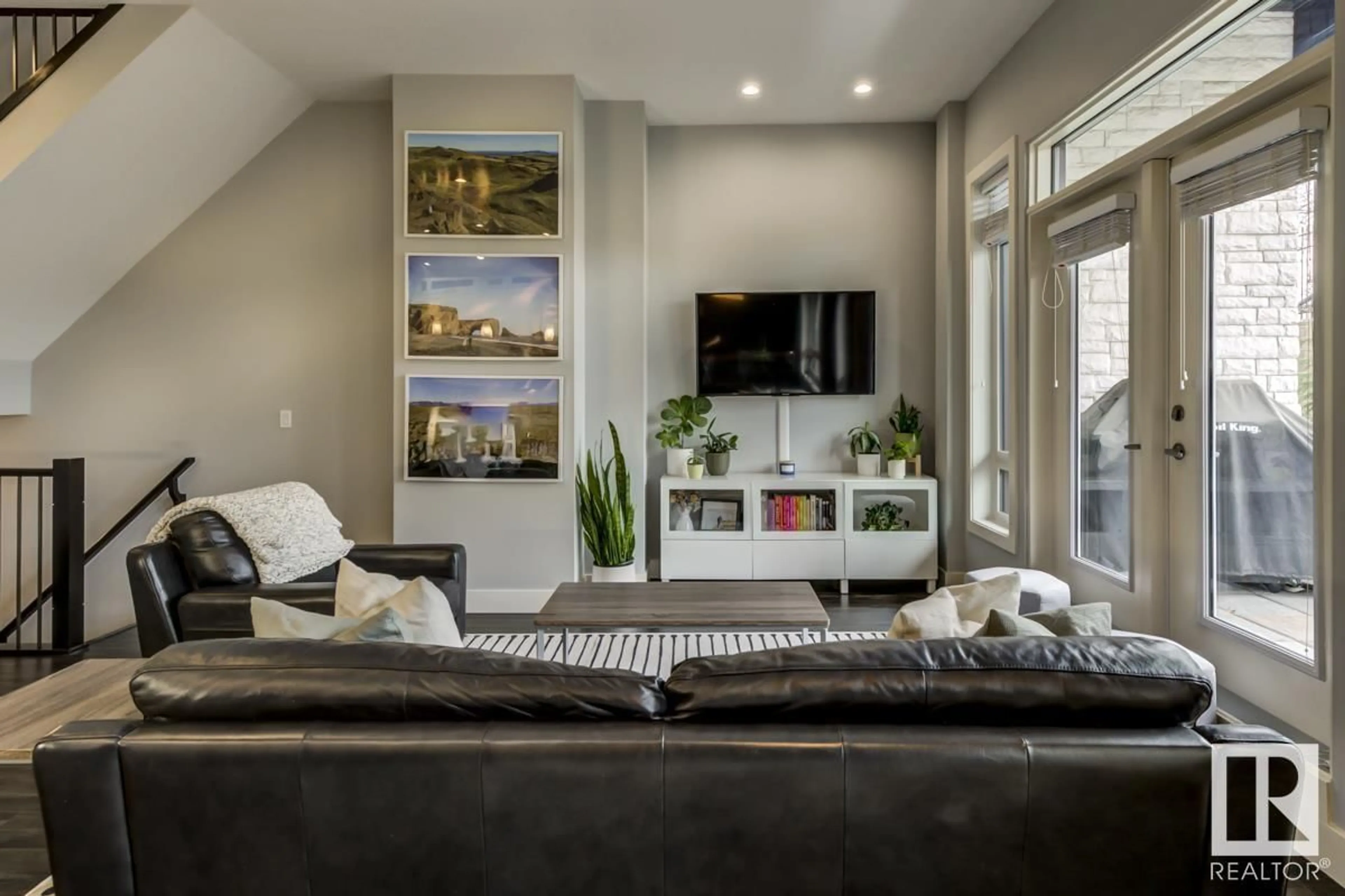 Living room with furniture, unknown for #104 - 1350 WINDERMERE WY, Edmonton Alberta T6W2J3
