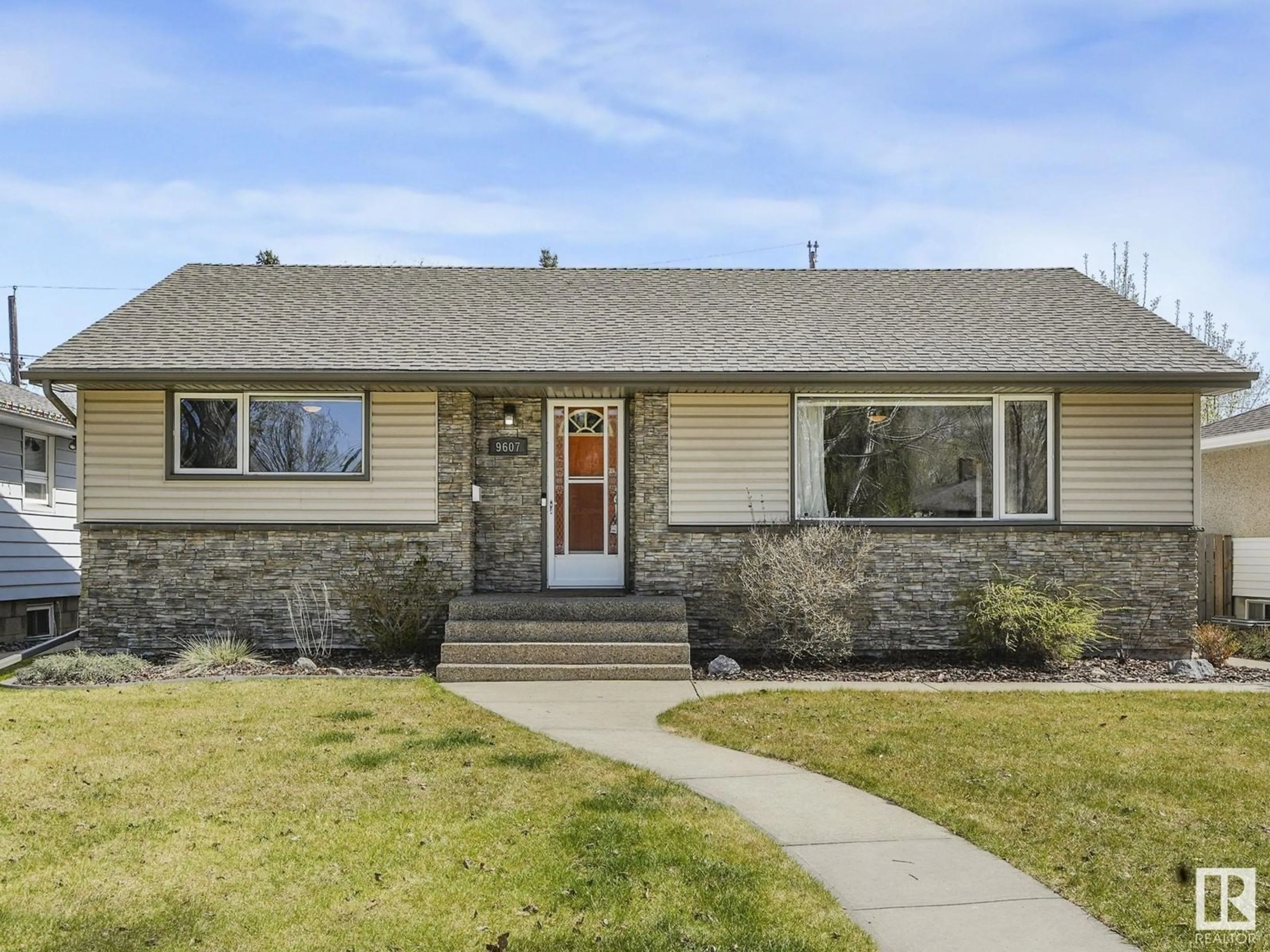 Home with vinyl exterior material, street for NW - 9607 77 ST, Edmonton Alberta T6C2M7