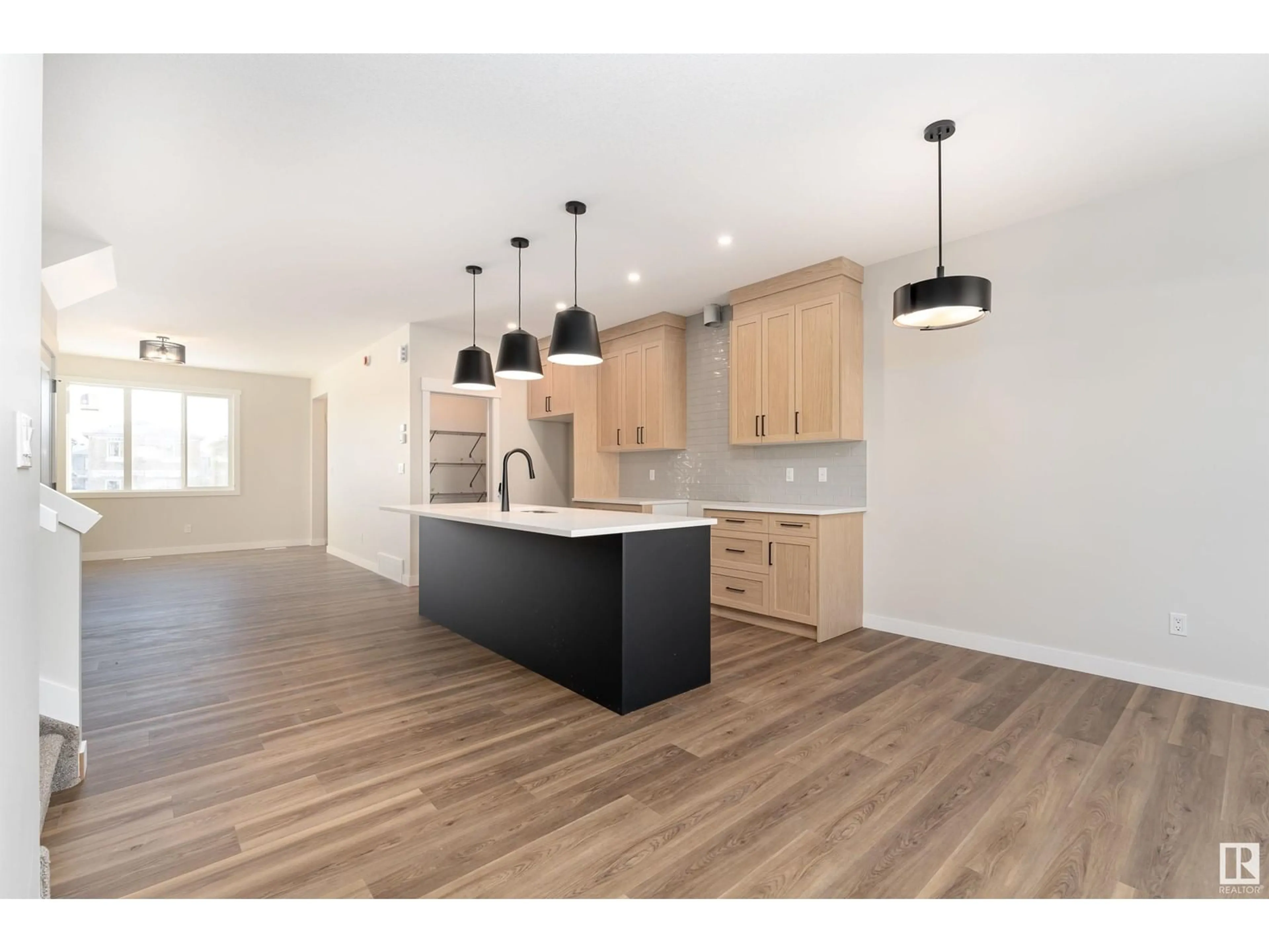 Open concept kitchen, wood/laminate floor for NW - 9351 222 ST, Edmonton Alberta T5T7T1