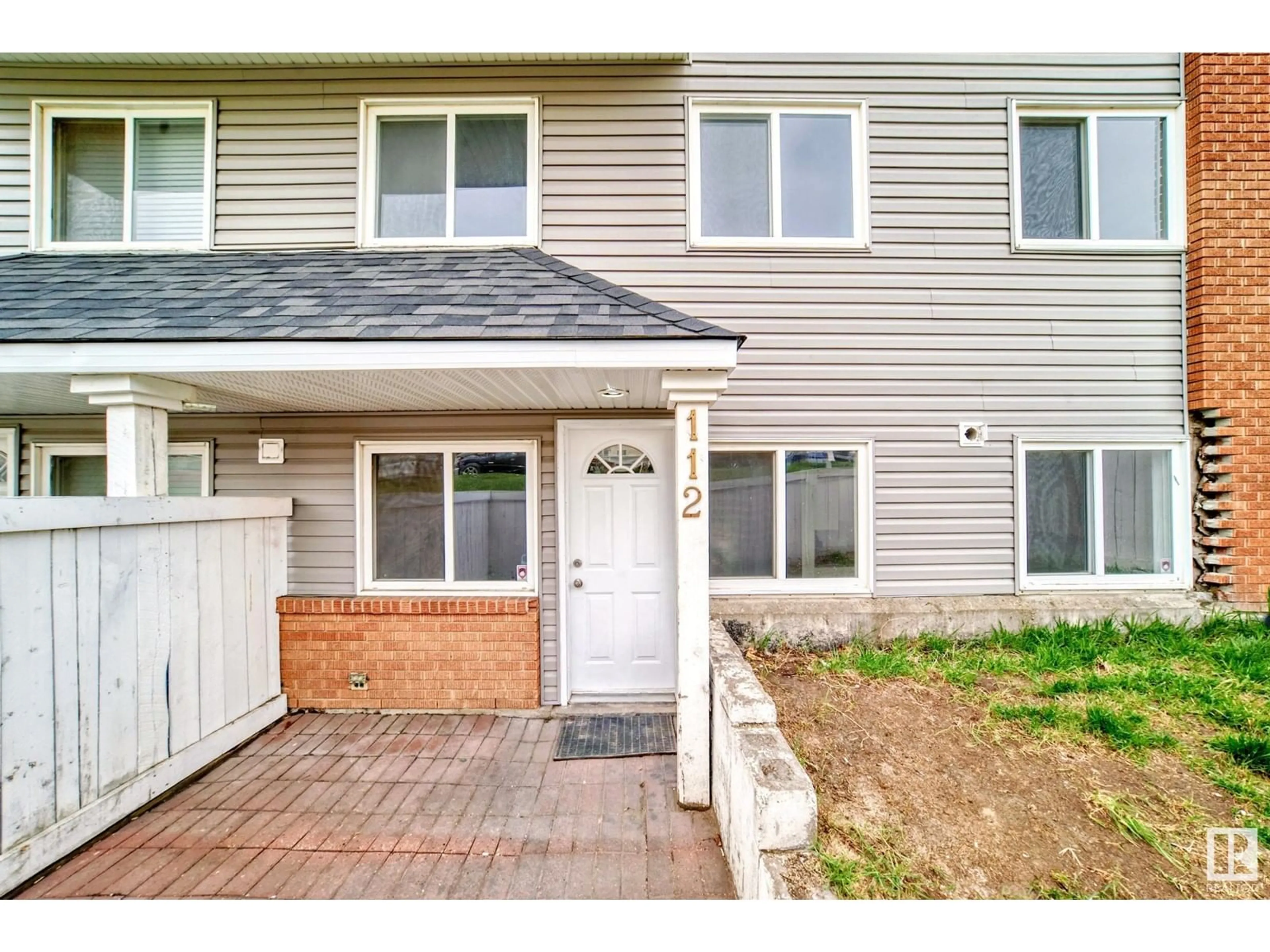 Home with vinyl exterior material, street for #112 - 14530 52 ST, Edmonton Alberta T5A3K5
