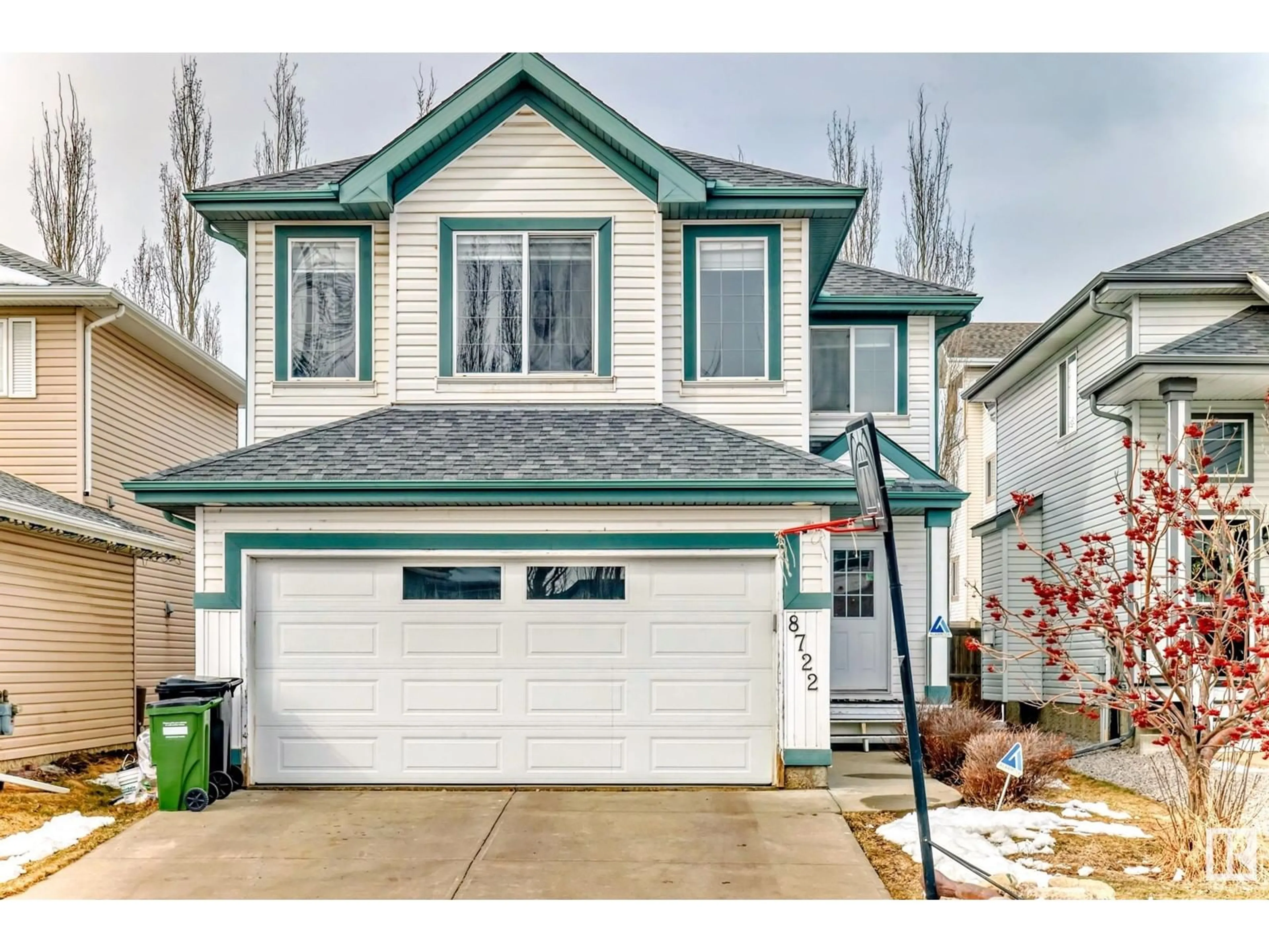 Home with vinyl exterior material, street for 8722 5 AV SW, Edmonton Alberta T6X1E2