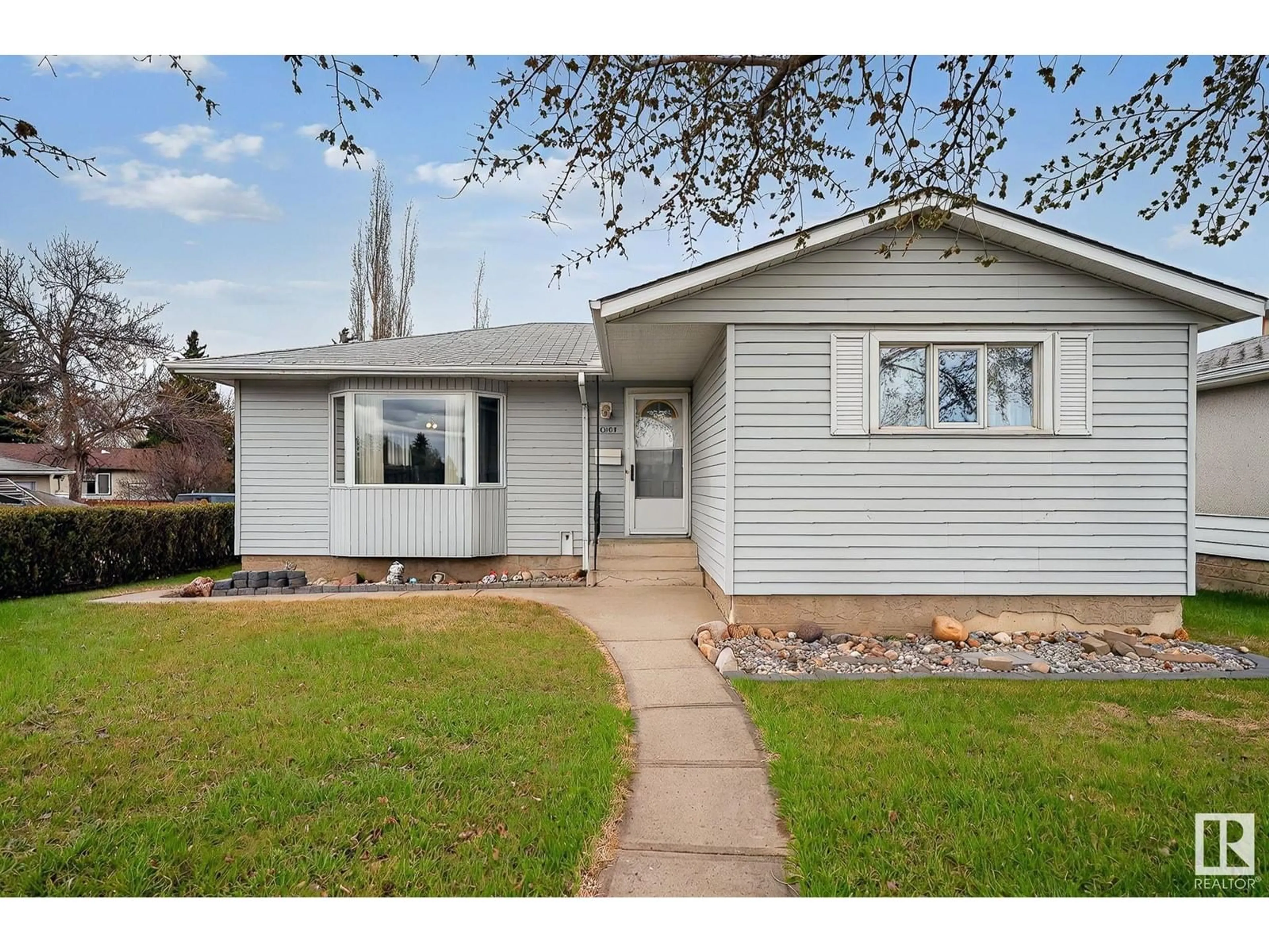 Home with vinyl exterior material, street for 10507 134A AV, Edmonton Alberta T5E1M1