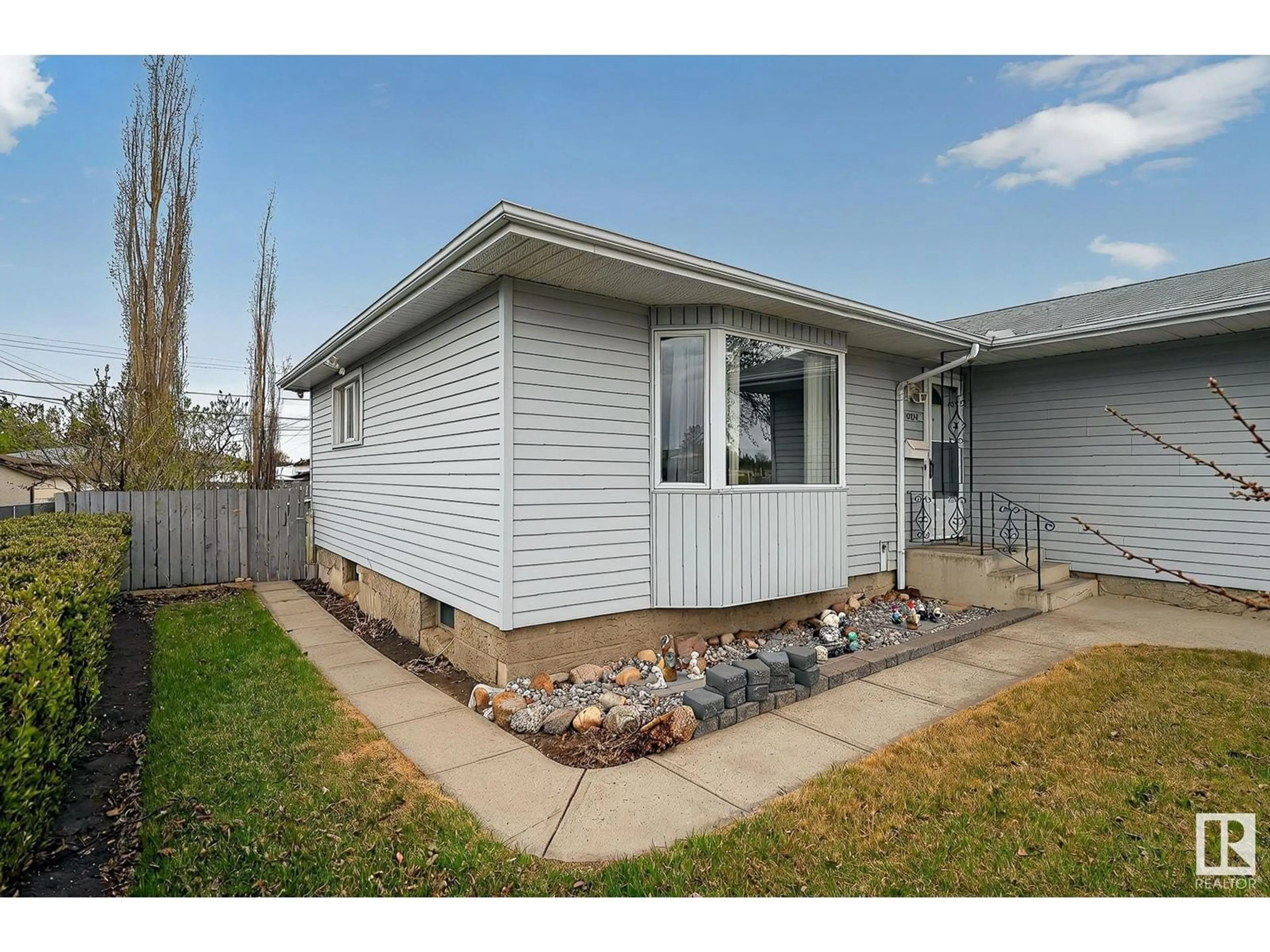 Home with vinyl exterior material, street for 10507 134A AV, Edmonton Alberta T5E1M1