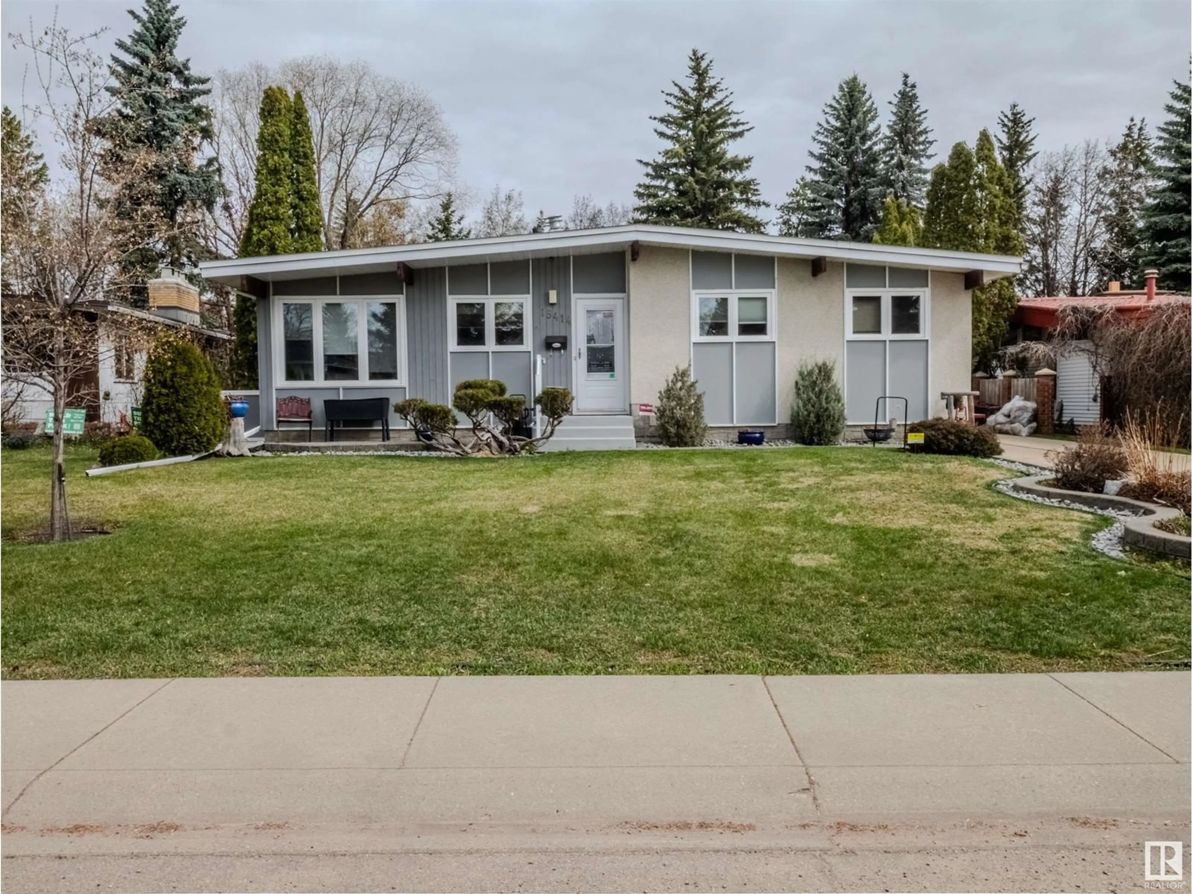 Home with vinyl exterior material, street for 15414 81 AV, Edmonton Alberta T5R3P1