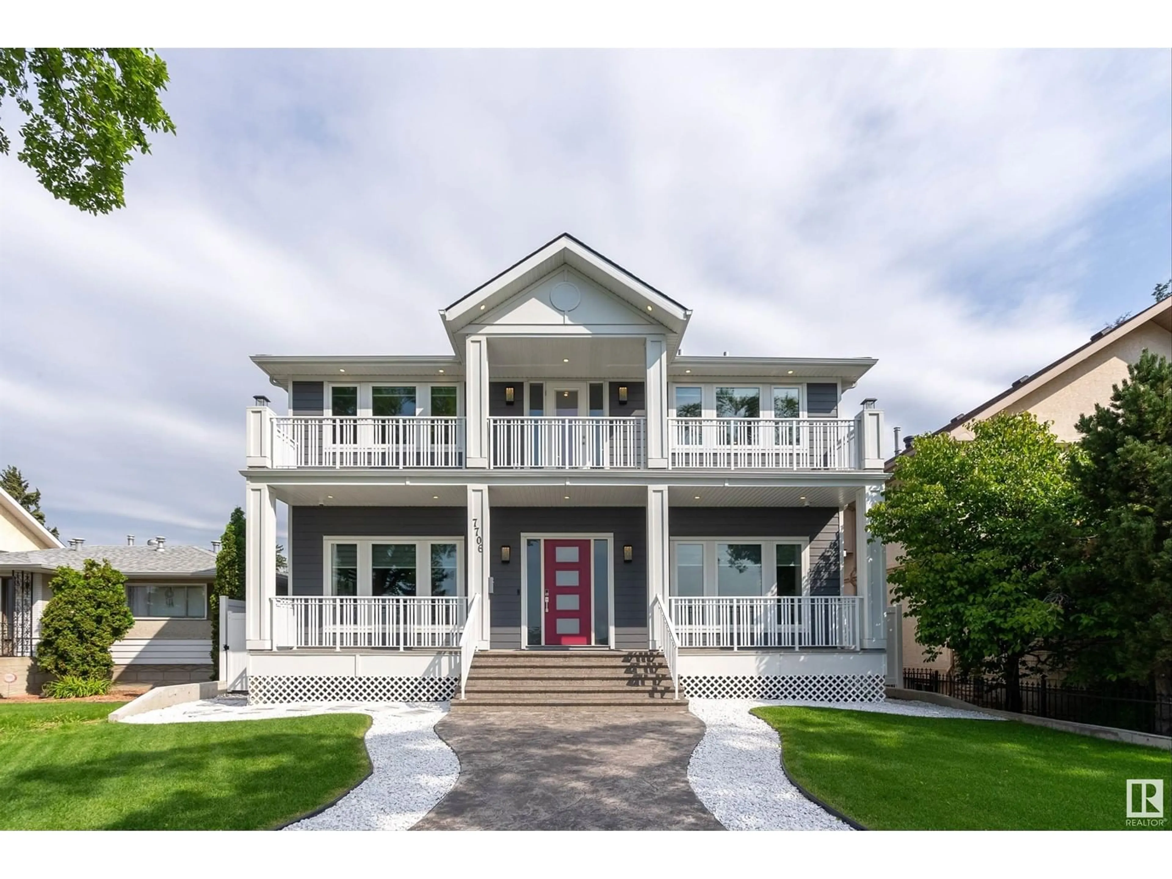 Home with vinyl exterior material, street for 7706 JASPER AV, Edmonton Alberta T5H3R8