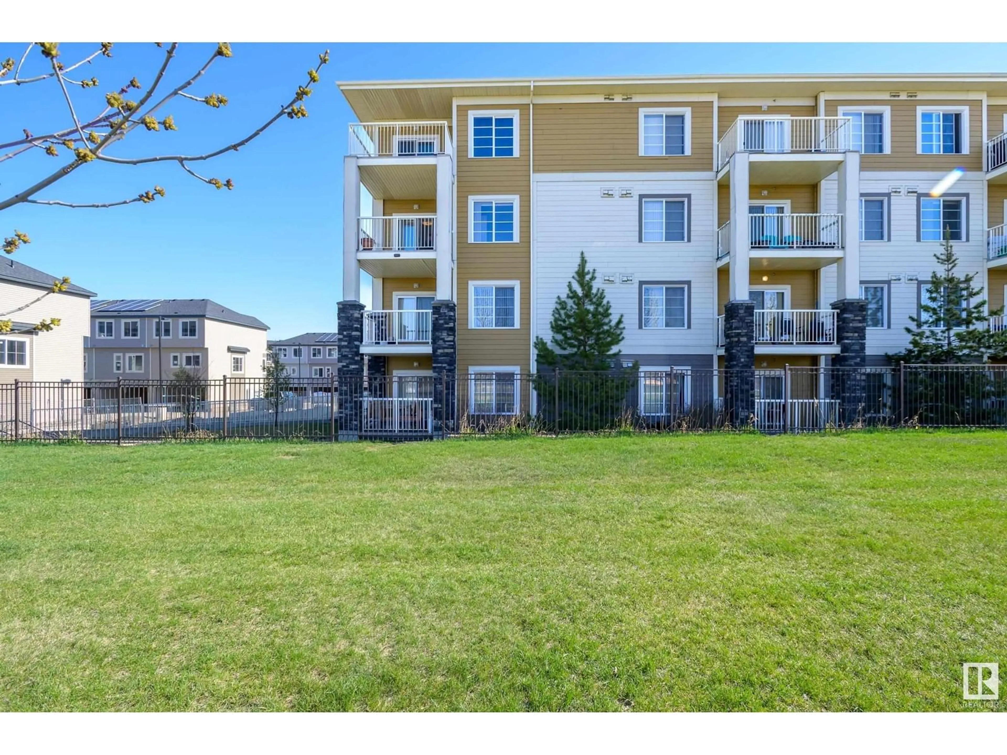 A pic from outside/outdoor area/front of a property/back of a property/a pic from drone, unknown for #306 - 3670 139 AV, Edmonton Alberta T5Y3N5