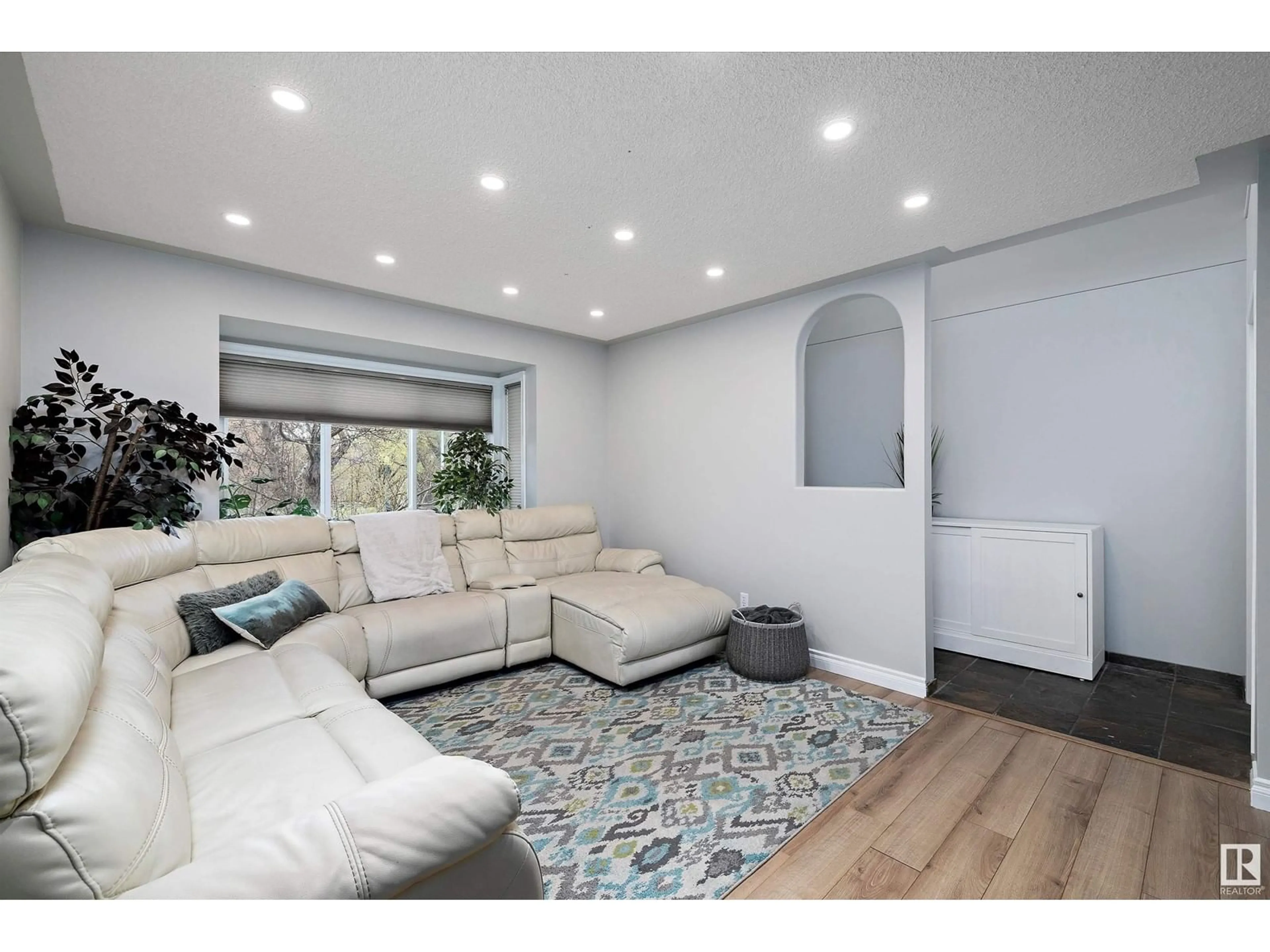 Living room with furniture, unknown for NW - 9323 98 AV, Edmonton Alberta T6C2C6