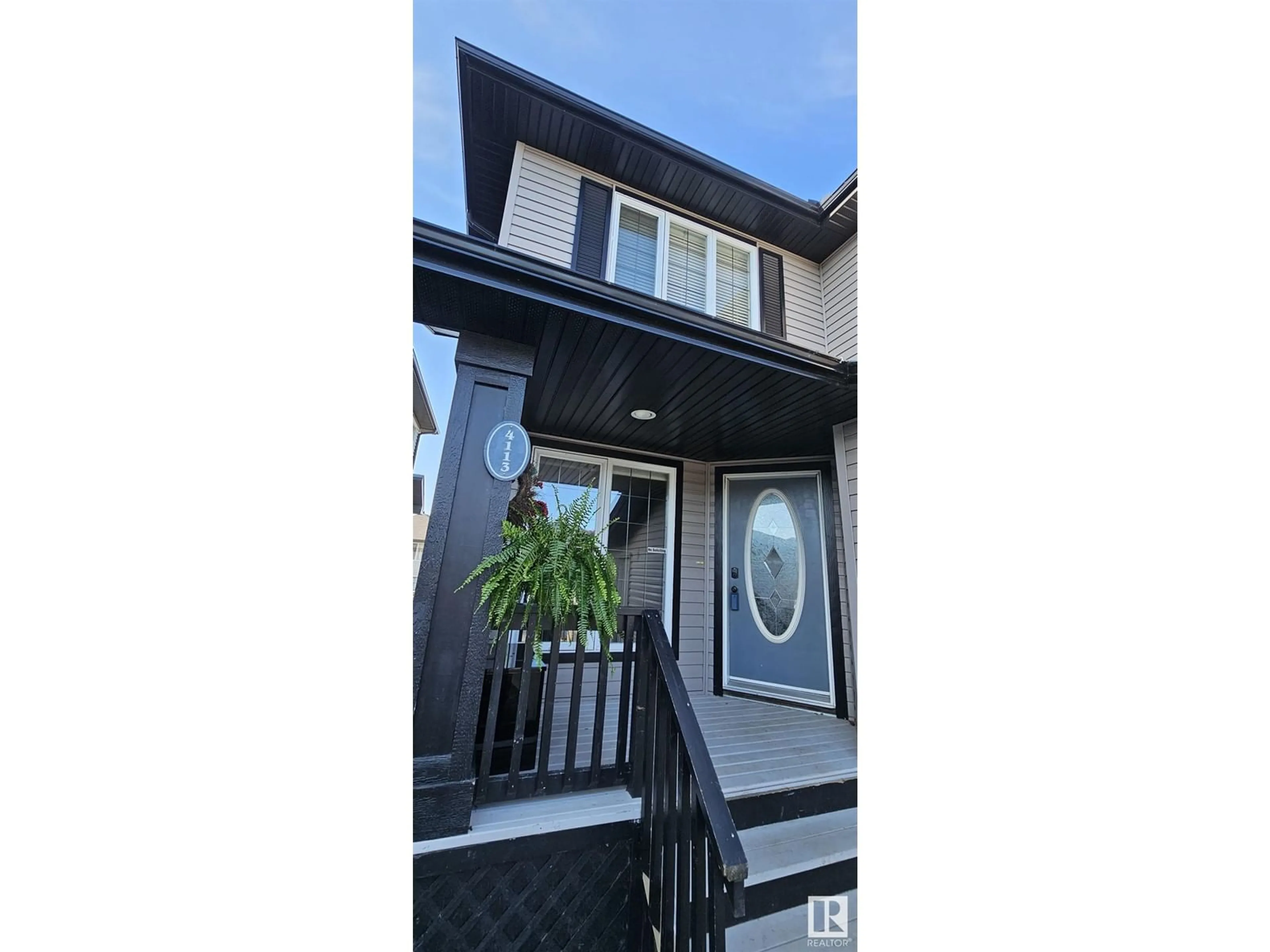 Home with vinyl exterior material, street for 4113 157A AV, Edmonton Alberta T5Y0A4