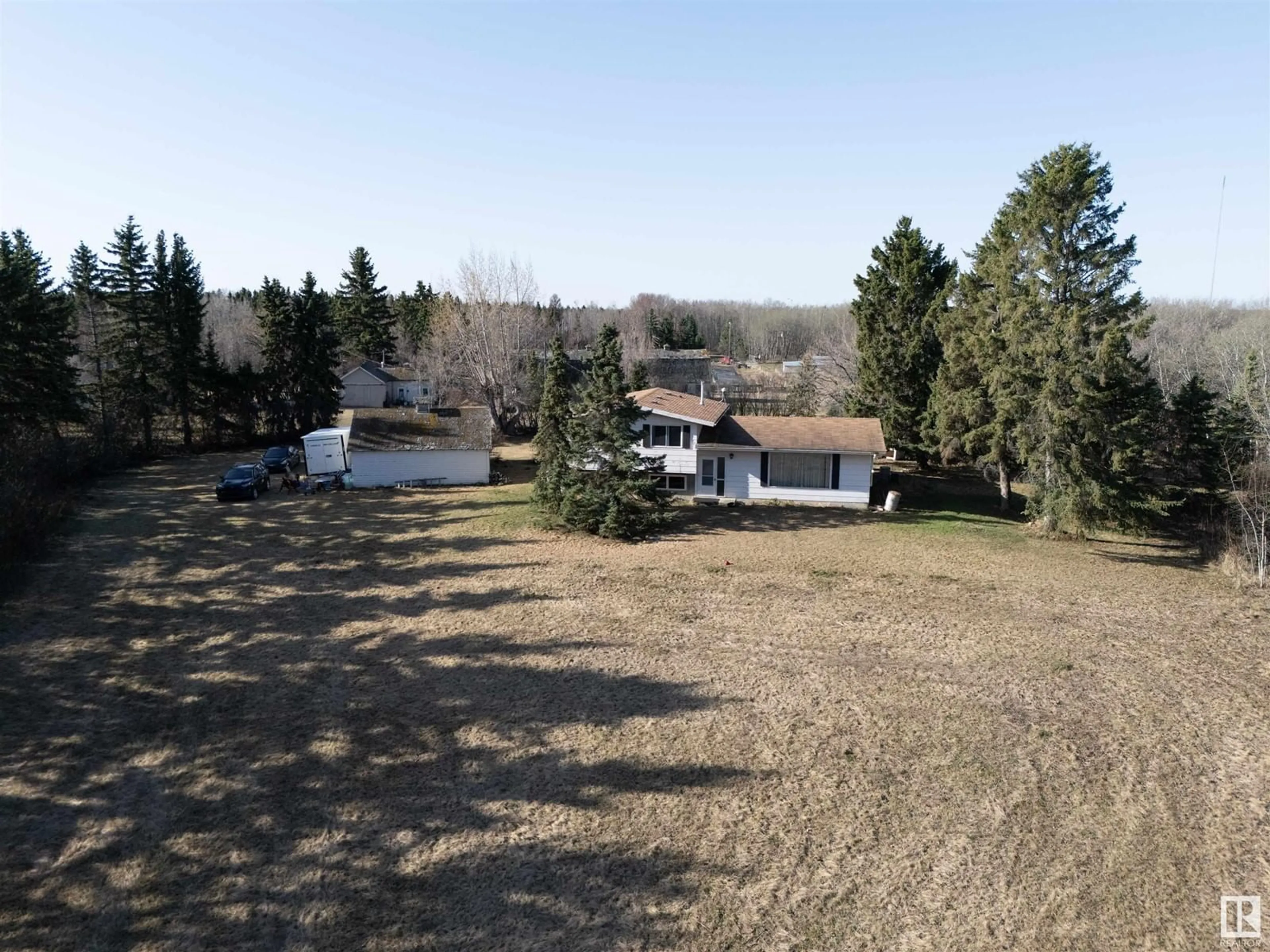A pic from outside/outdoor area/front of a property/back of a property/a pic from drone, forest/trees view for 22371 TWP ROAD 512, Rural Strathcona County Alberta T8C1H2