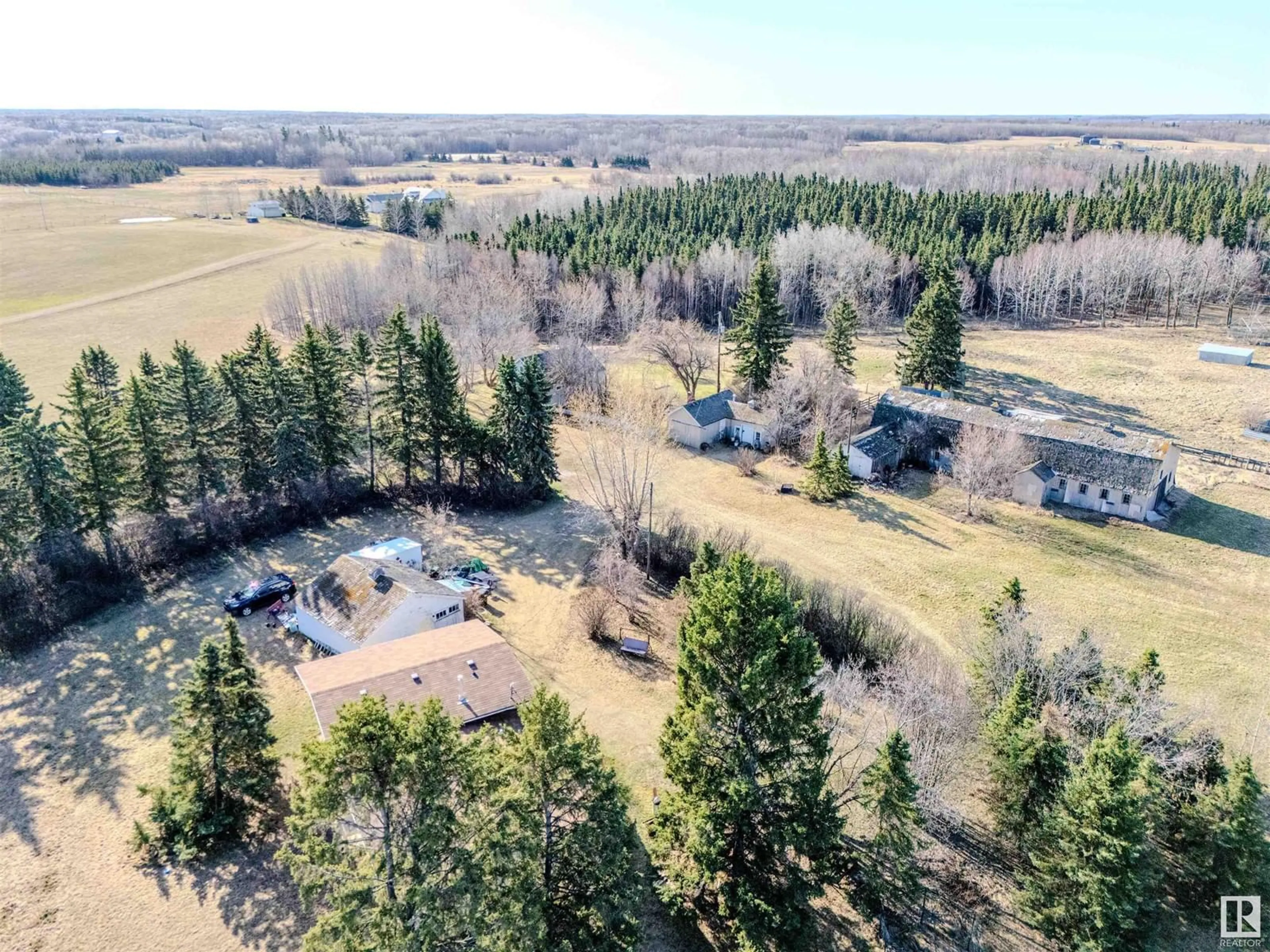 A pic from outside/outdoor area/front of a property/back of a property/a pic from drone, forest/trees view for 22371 TWP ROAD 512, Rural Strathcona County Alberta T8C1H2