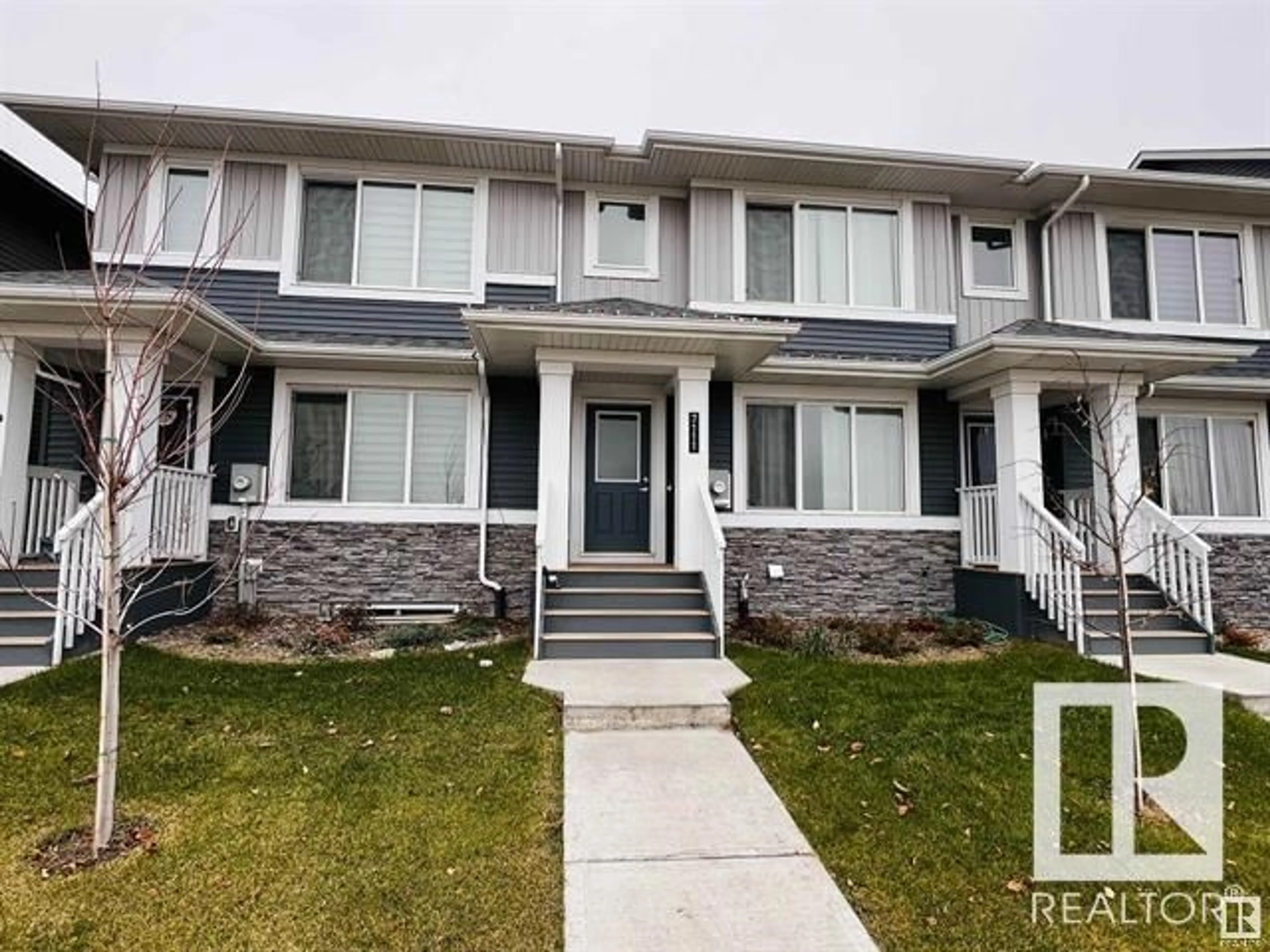 Home with vinyl exterior material, street for NW - 7111 178 AV, Edmonton Alberta T5Z0T4
