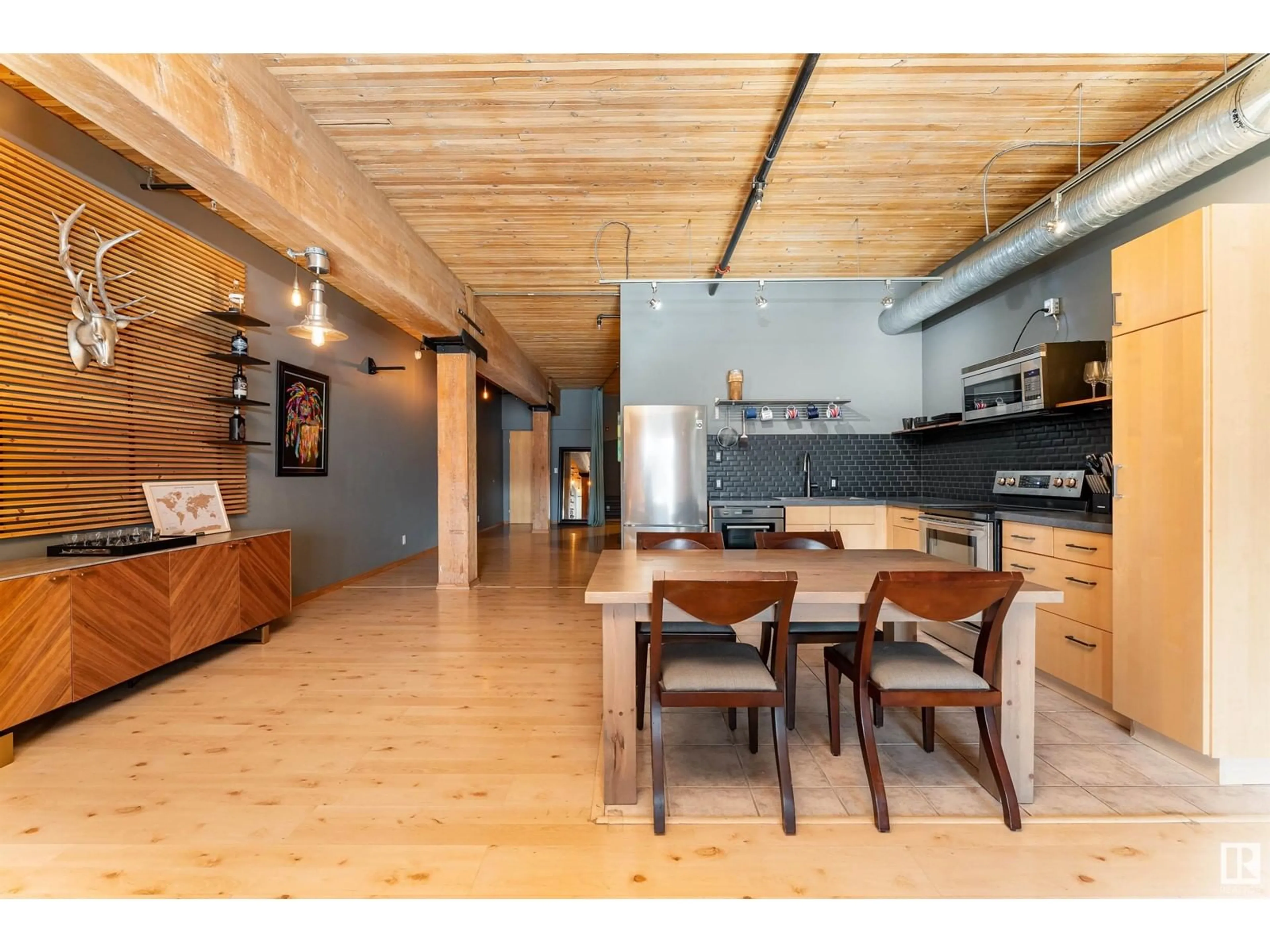 Open concept kitchen, wood/laminate floor for 305 - 10301 109 ST, Edmonton Alberta T5J1N4