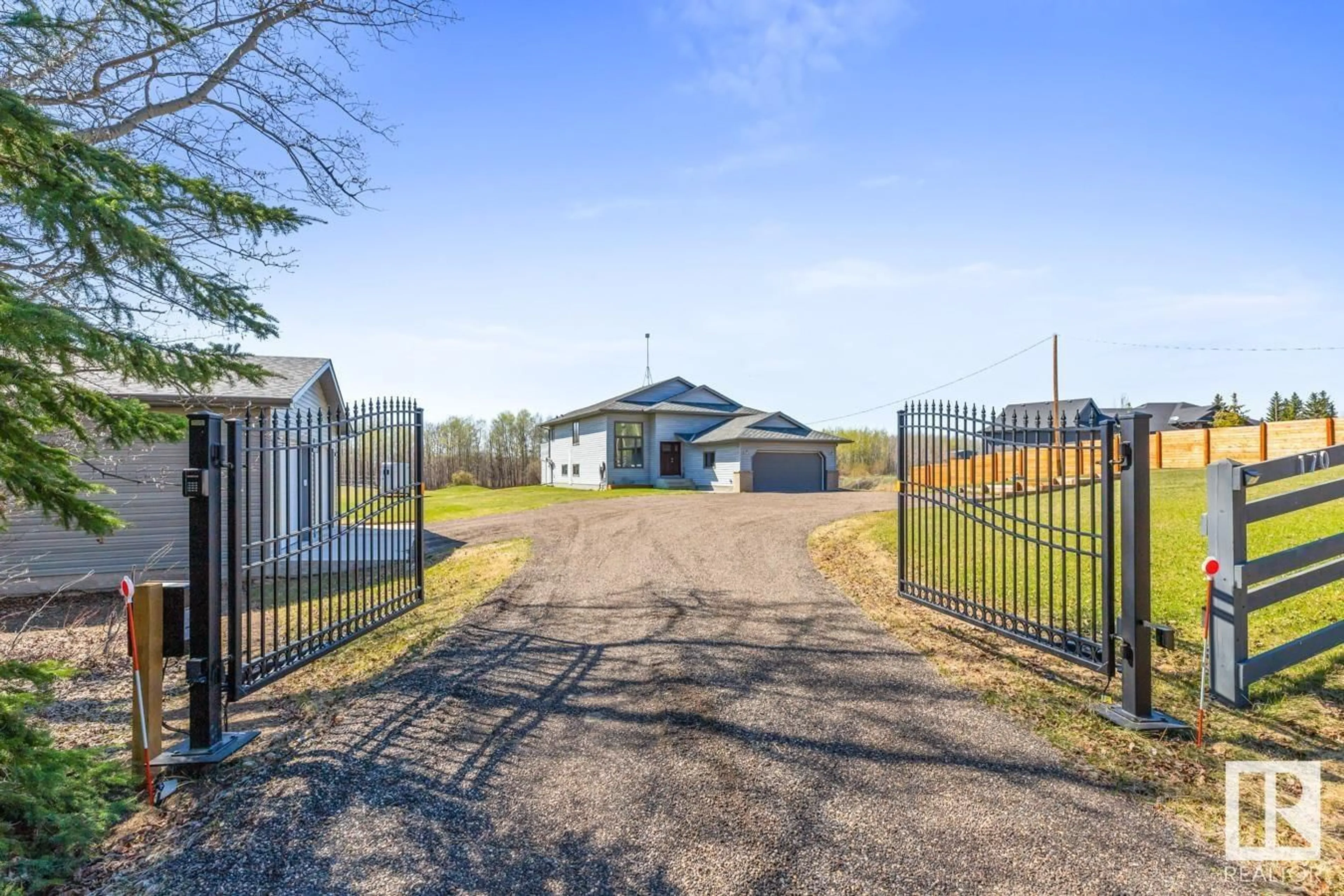 A pic from outside/outdoor area/front of a property/back of a property/a pic from drone, unknown for 50450 - 170 RR 222 RR, Rural Leduc County Alberta T0B3M2