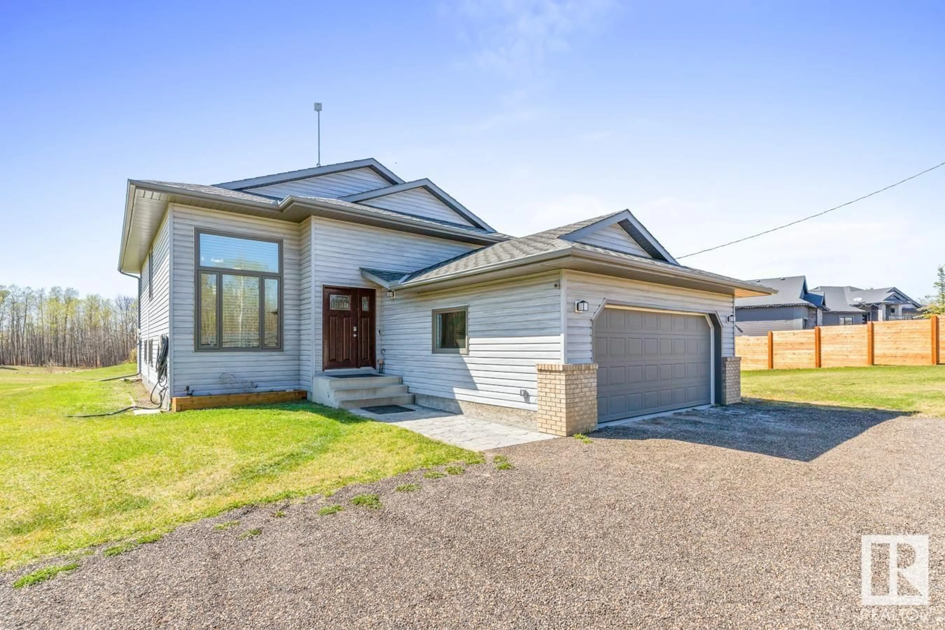A pic from outside/outdoor area/front of a property/back of a property/a pic from drone, street for 50450 - 170 RR 222 RR, Rural Leduc County Alberta T0B3M2
