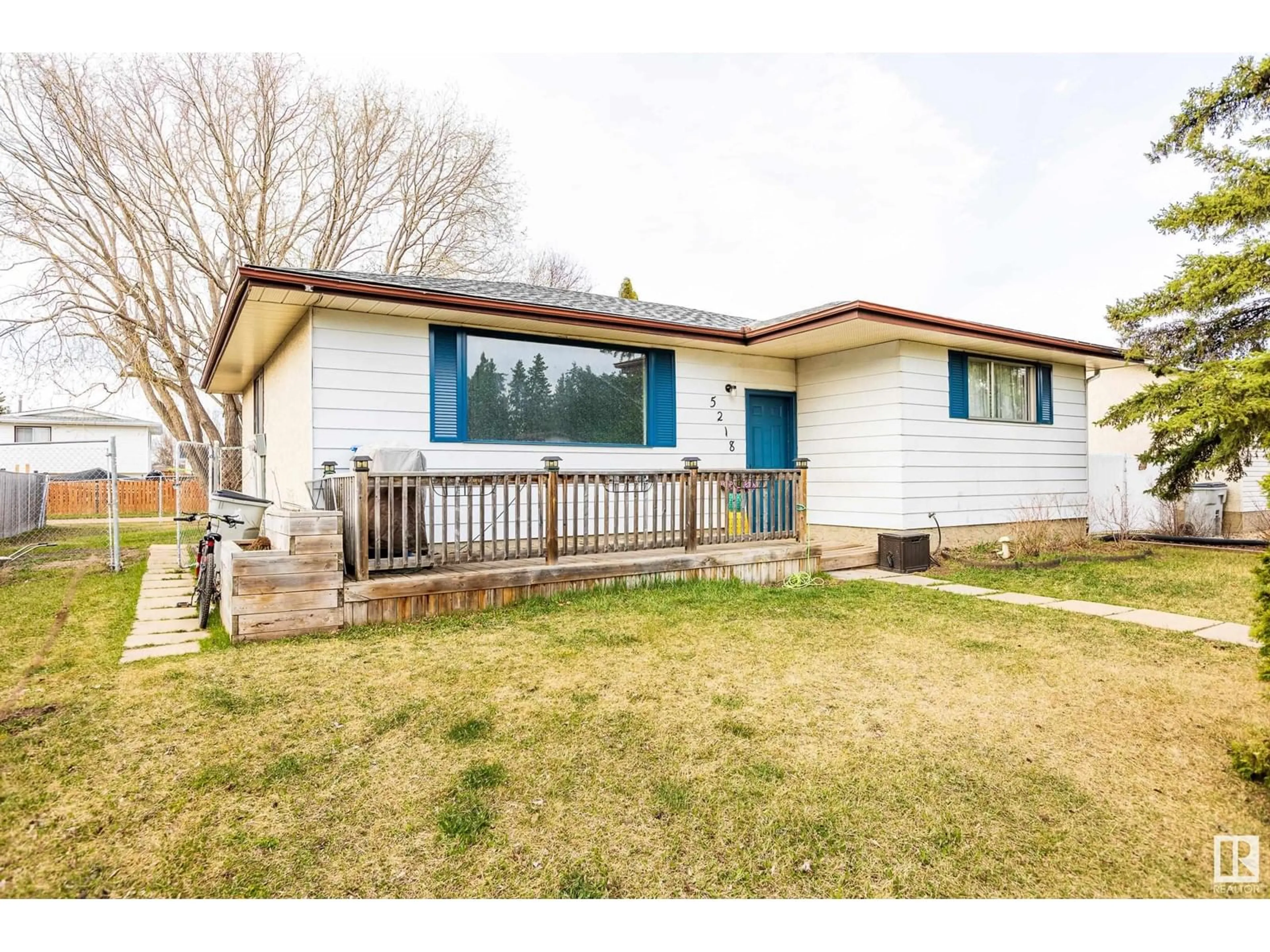 Home with vinyl exterior material, street for 5218 51A AV, Legal Alberta T0G1L0