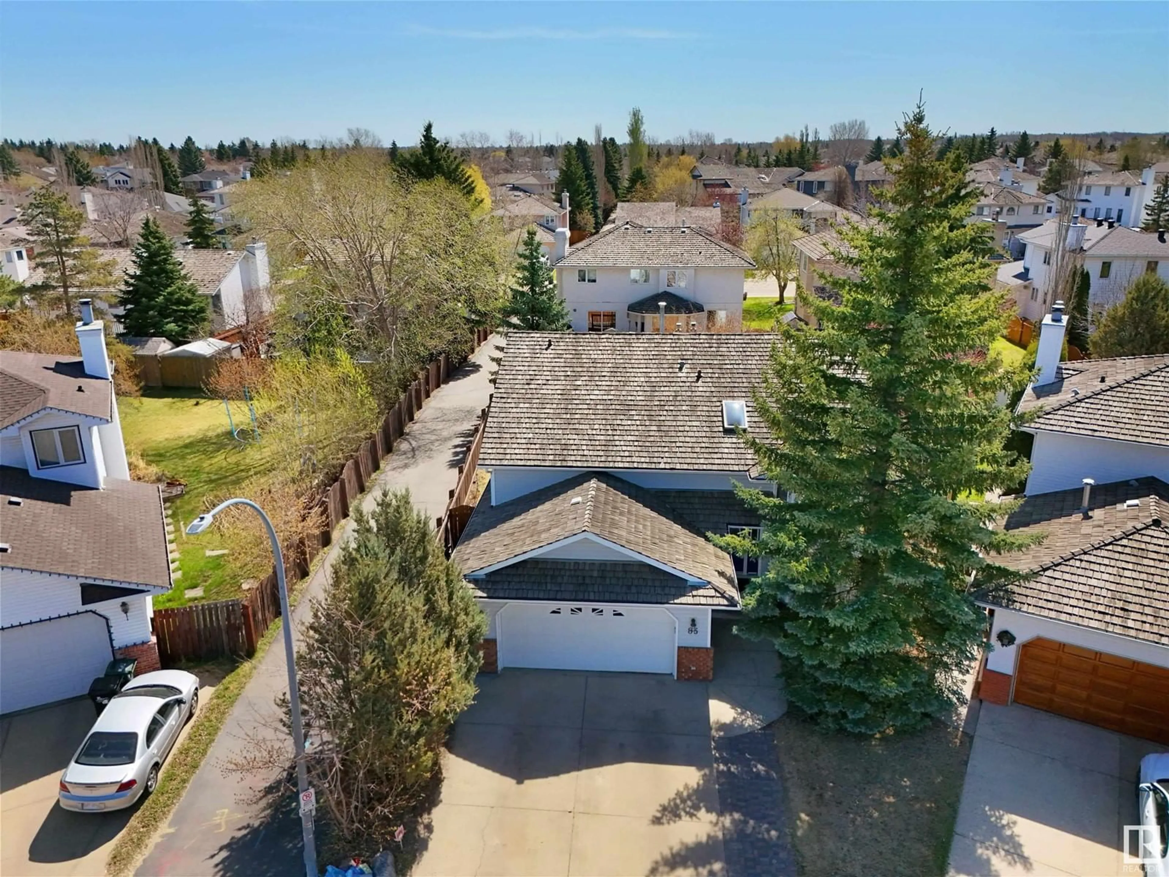 A pic from outside/outdoor area/front of a property/back of a property/a pic from drone, street for 85 RAVEN DR, Sherwood Park Alberta T8A5N7